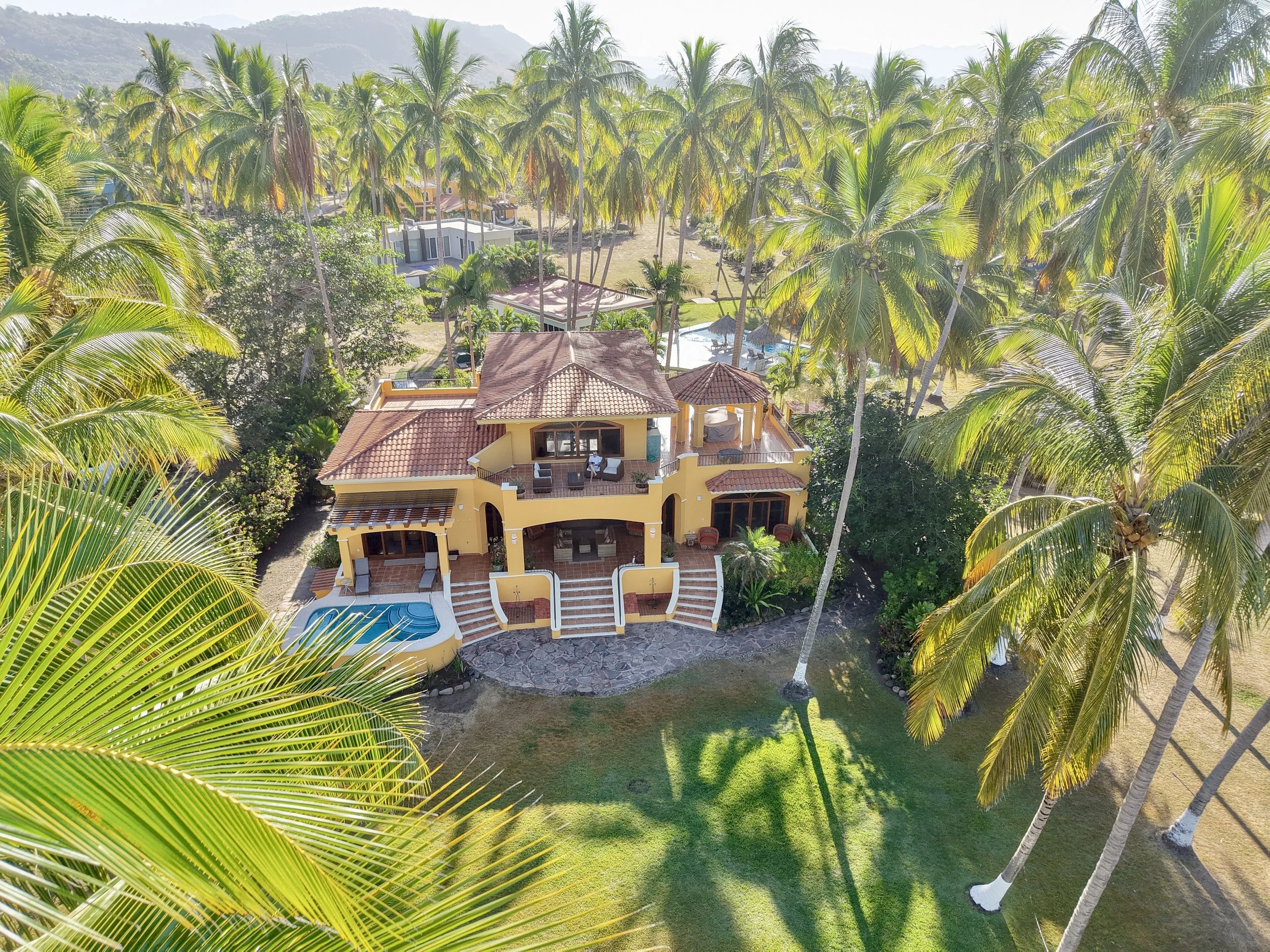 Directly on the beach, you have unobstructed views of the ocean and beach.  No neighbors are visible at all. 