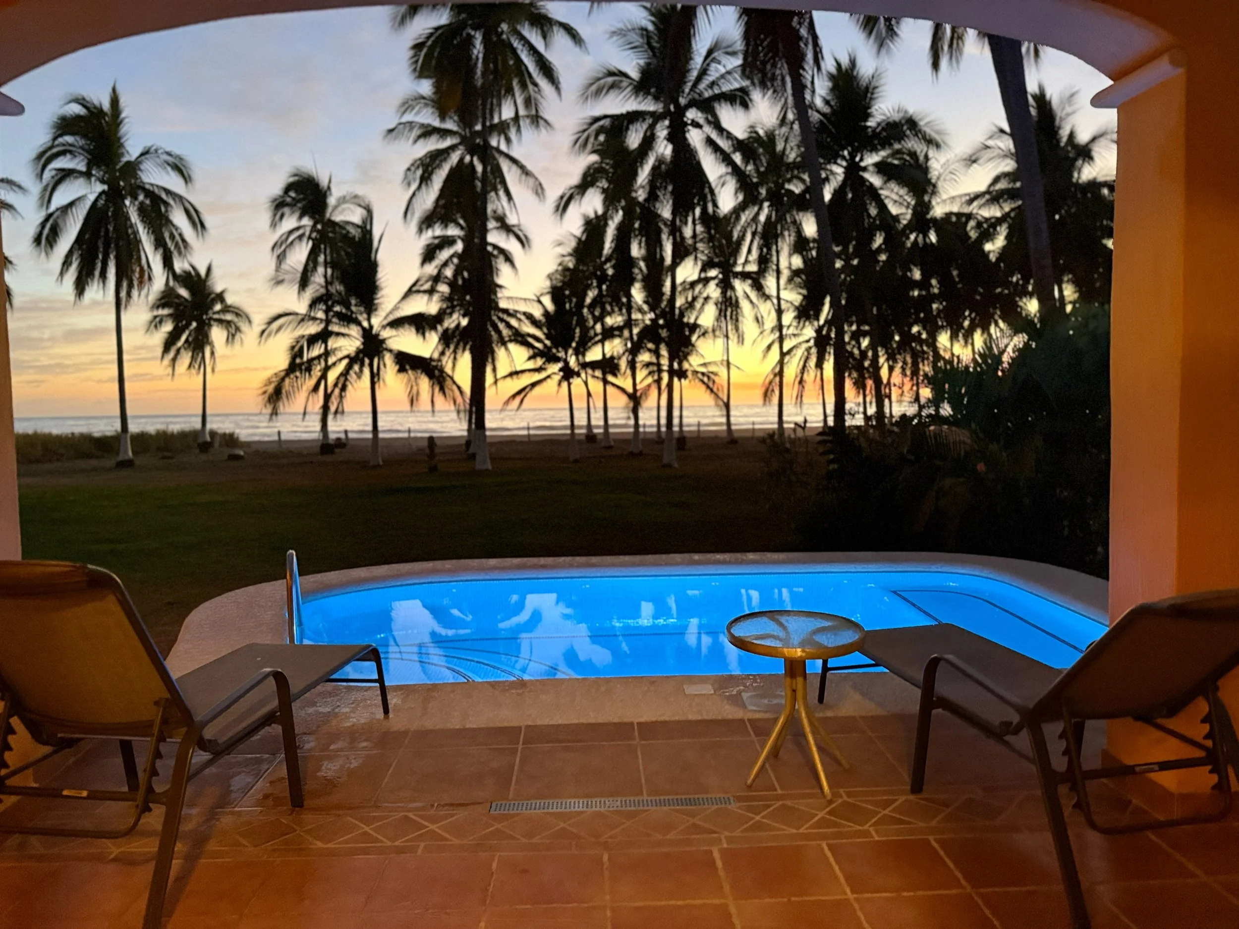 Relax at night in our pool, overlooking the sunset