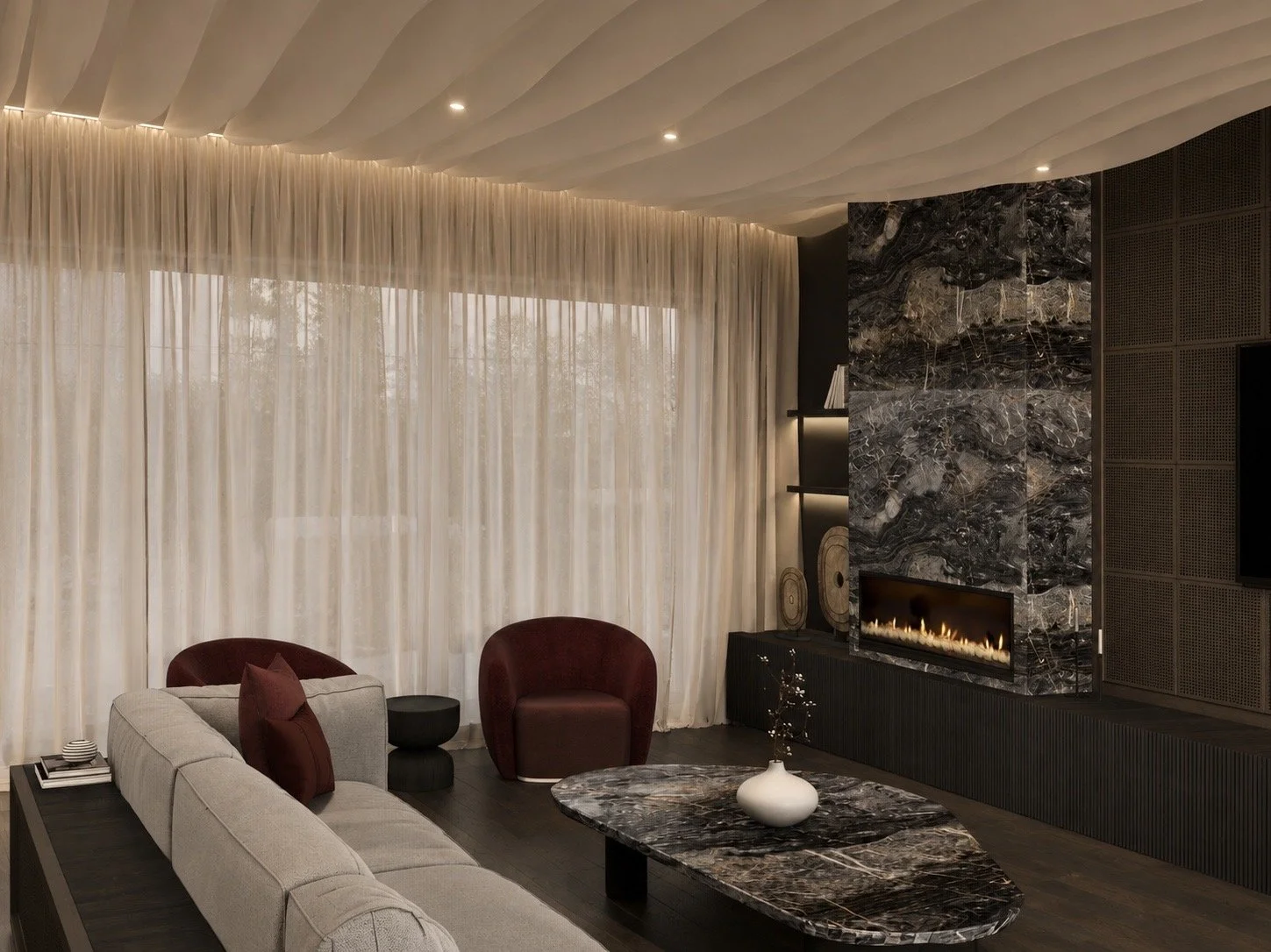 Modern living room with beige sofa, maroon chairs, a black coffee table with a white vase, a fireplace with a marble surround, and sheer curtains over windows.