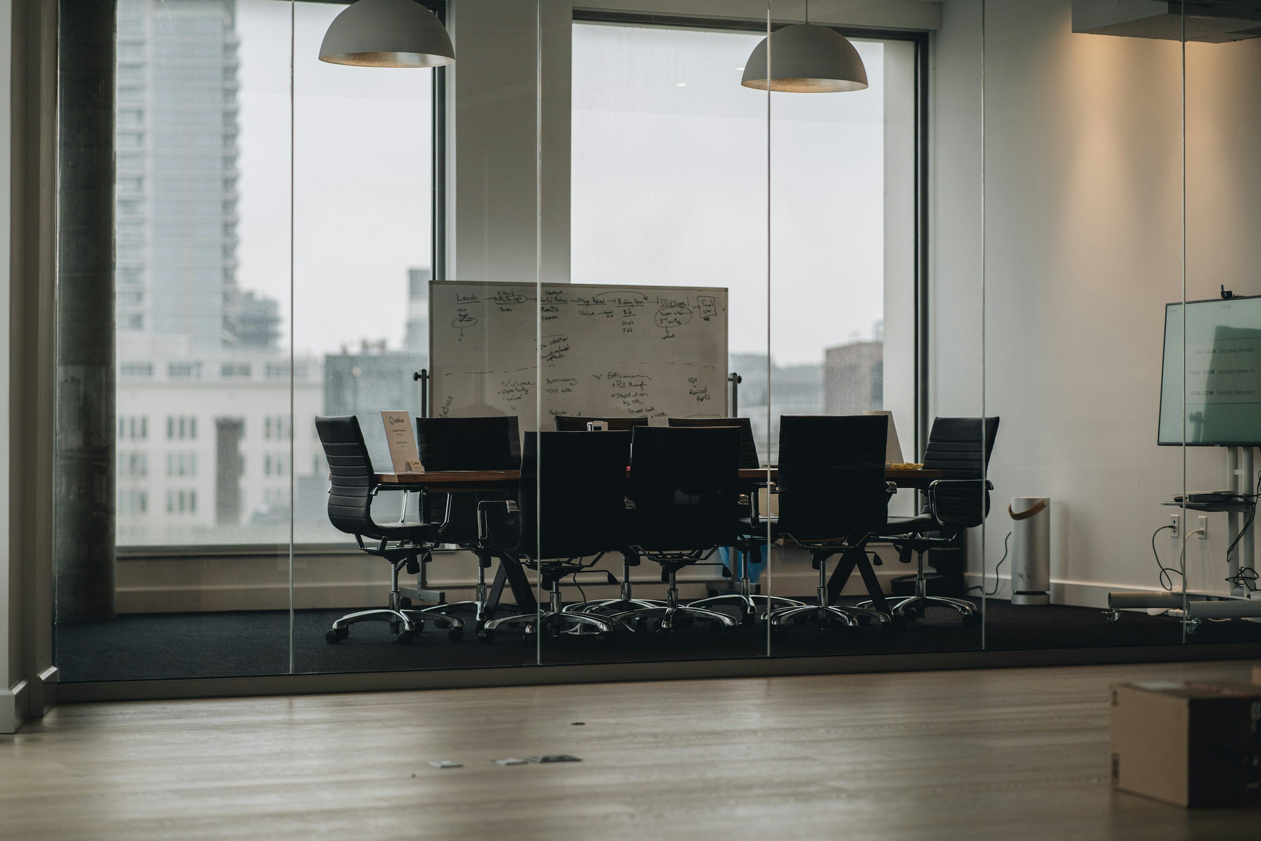 Image of a view from the outside of an empty conference room
