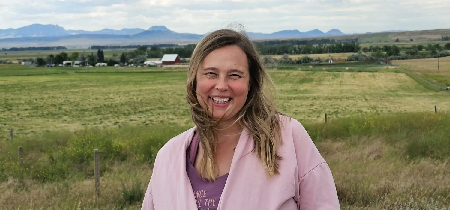 Corrine Fosnaugh standing in front of Montana Ranch