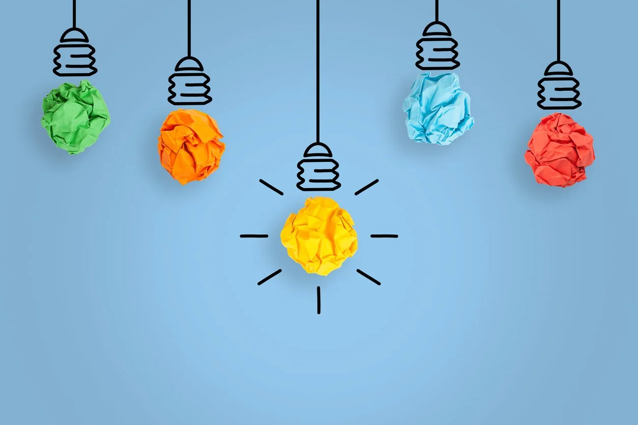 5 colourful scrunched up paper lightbulbs