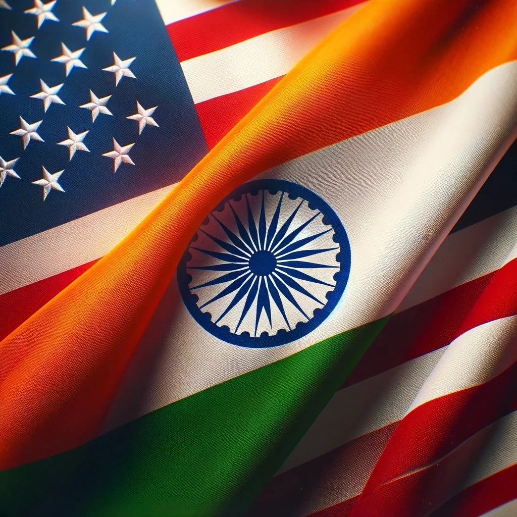 DALL·E 2024-06-03 12.05.15 - An image showing the flags of India and the United States together. The Indian flag with its orange, white, and green horizontal stripes and the blue .jpg