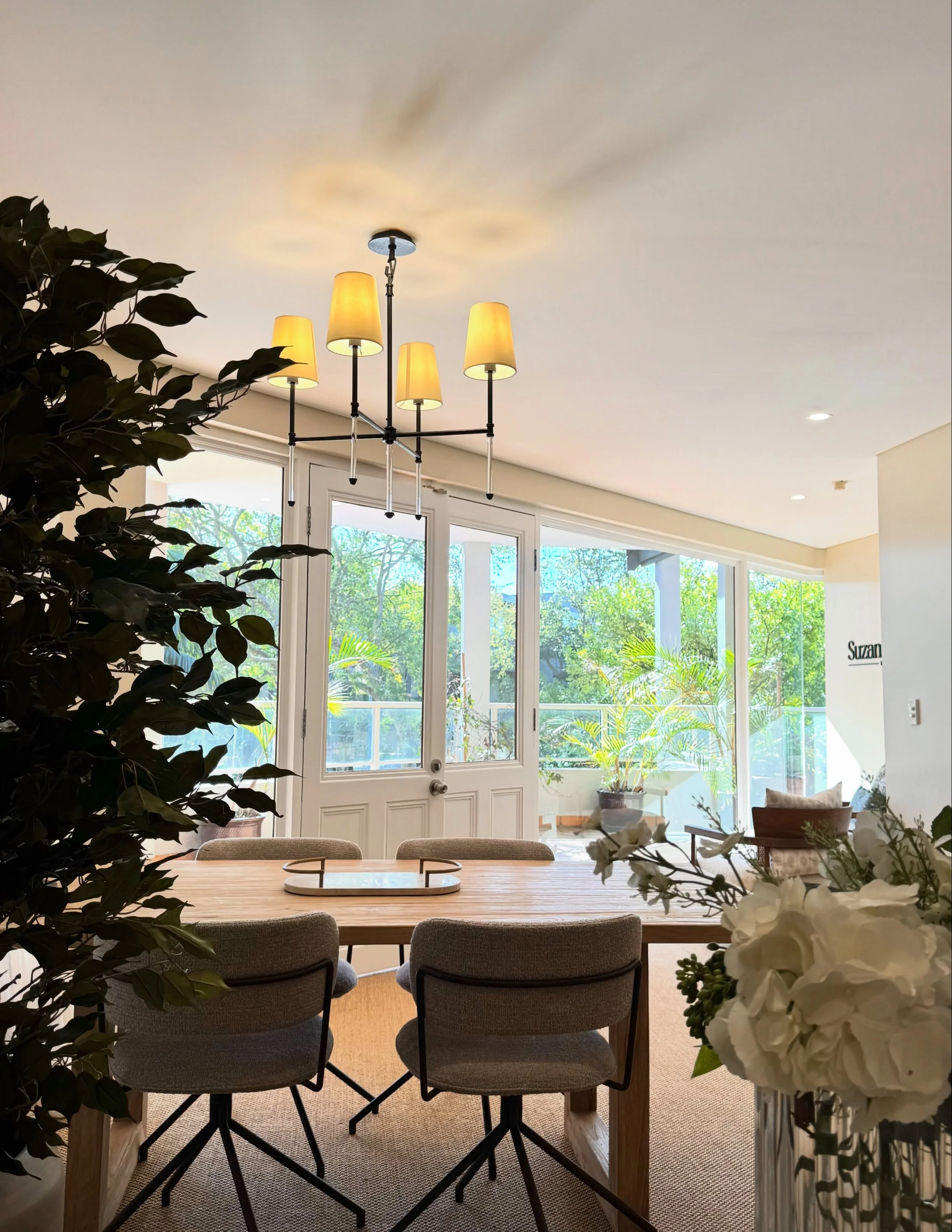 Step inside our studio - a light-filled haven where ideas take shape among sculptural furniture and layers of warm texture. We gather around a hand-crafted table to plan, review projects on your curved monitor, and draw inspiration from vintage piece