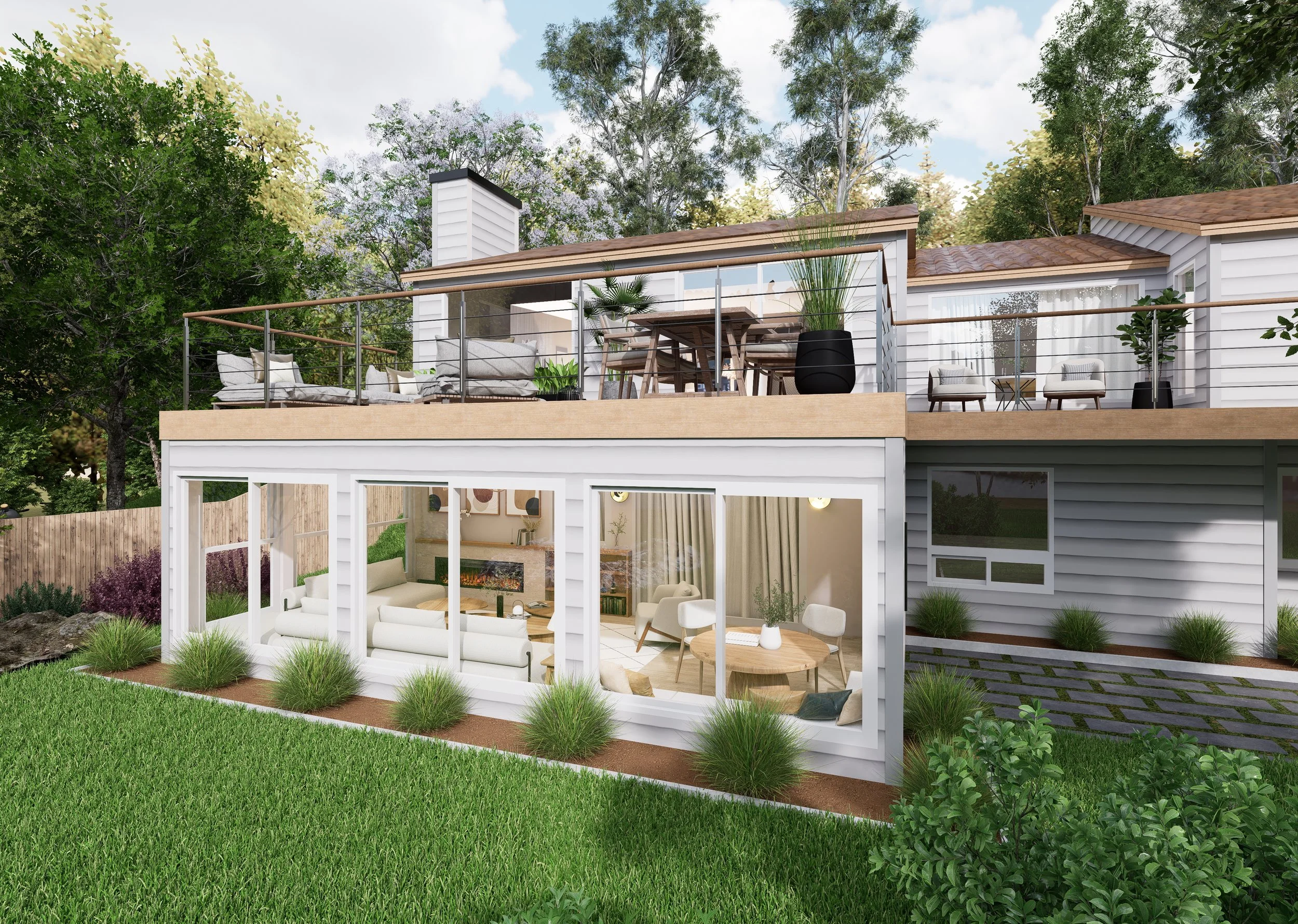 A two-story house with a spacious upper deck outdoor seating area and a lower enclosed porch with large windows, surrounded by green grass and trees.