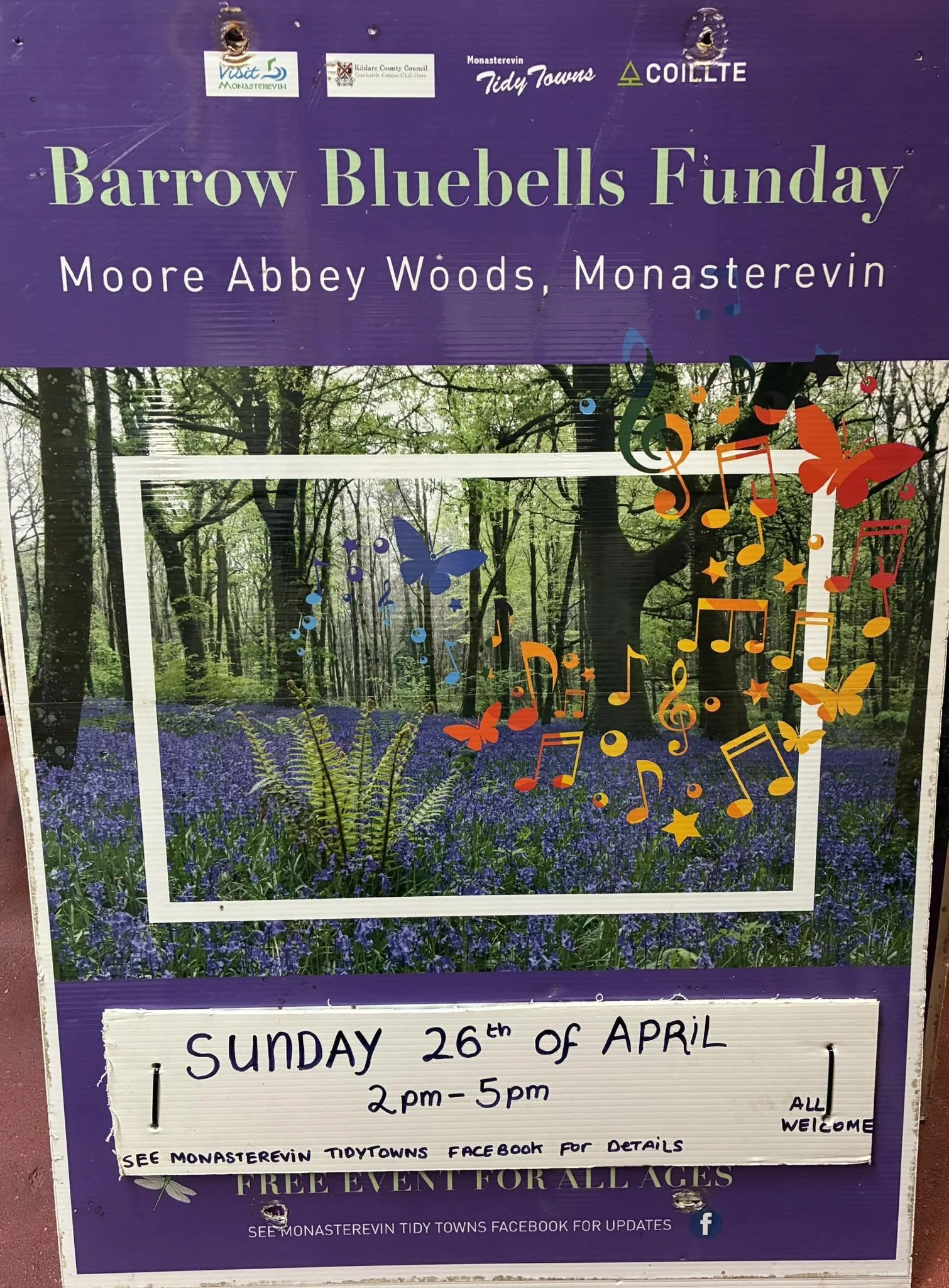 Poster advertising FAmily day as per description below, Image is of the woods with a floor covering of blubells and a single fern plant groeing in the middle. Images of music notes are overlayed on top