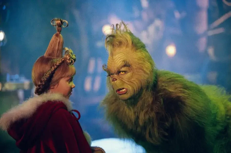 young girl pictured with the grinch