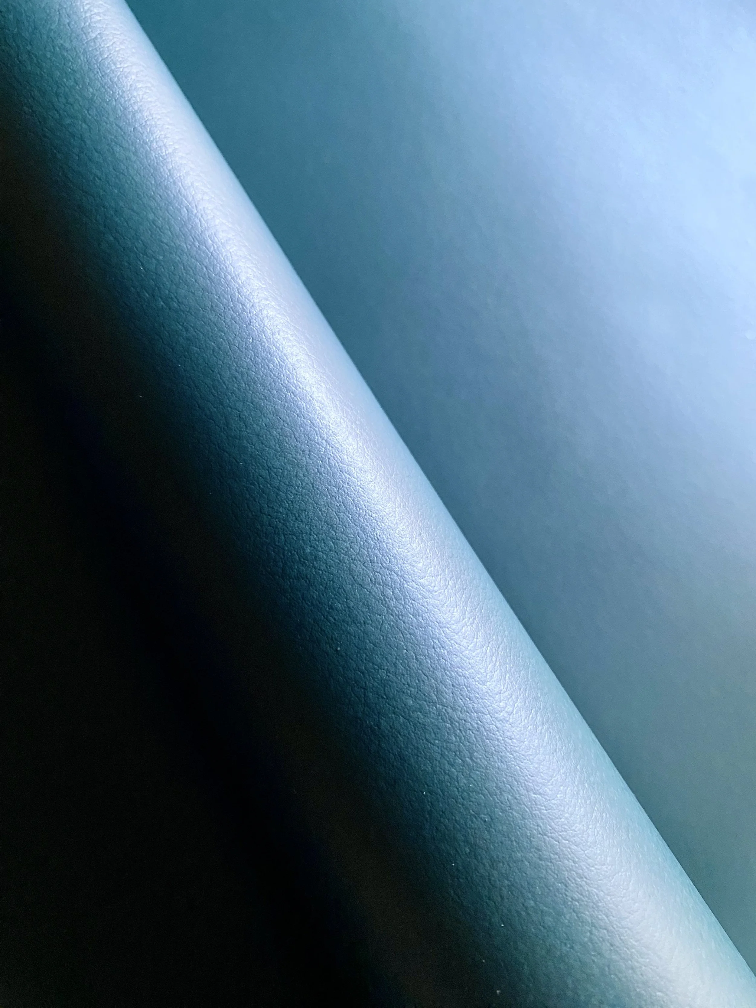 Gradient blue Elevate™ is an innovative bio-based leather alternative developed by Uncaged Innovations.