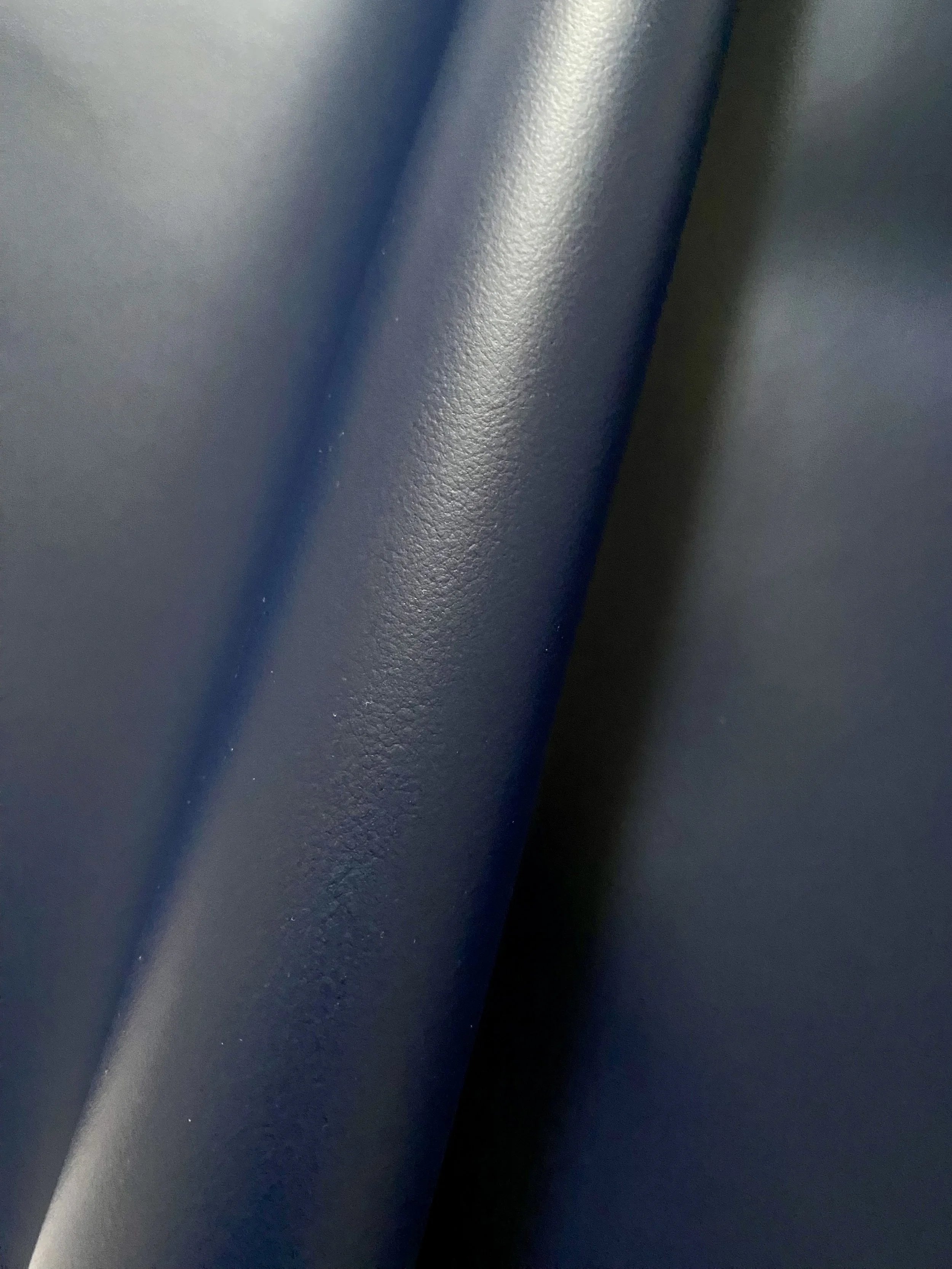Dark navy blue Elevate™ is an innovative bio-based leather alternative developed by Uncaged Innovations.