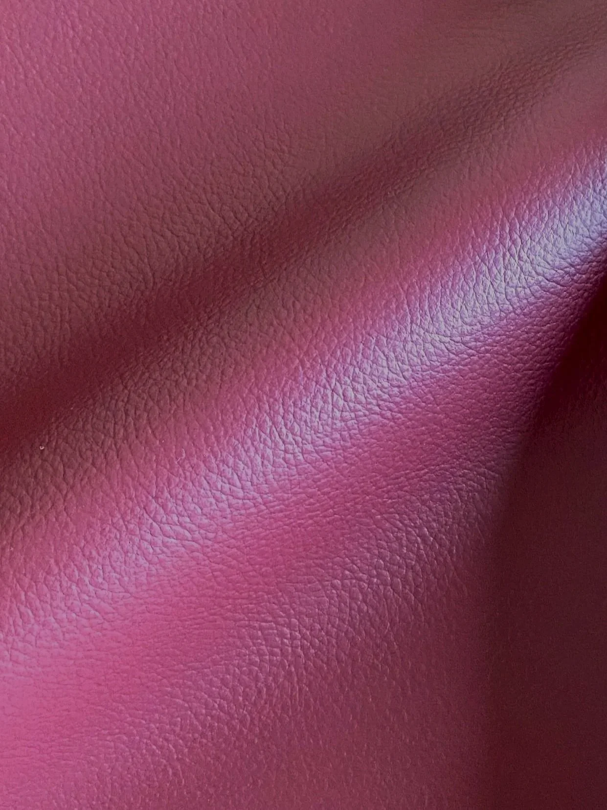 Red Elevate™ is an innovative bio-based leather alternative developed by Uncaged Innovations.