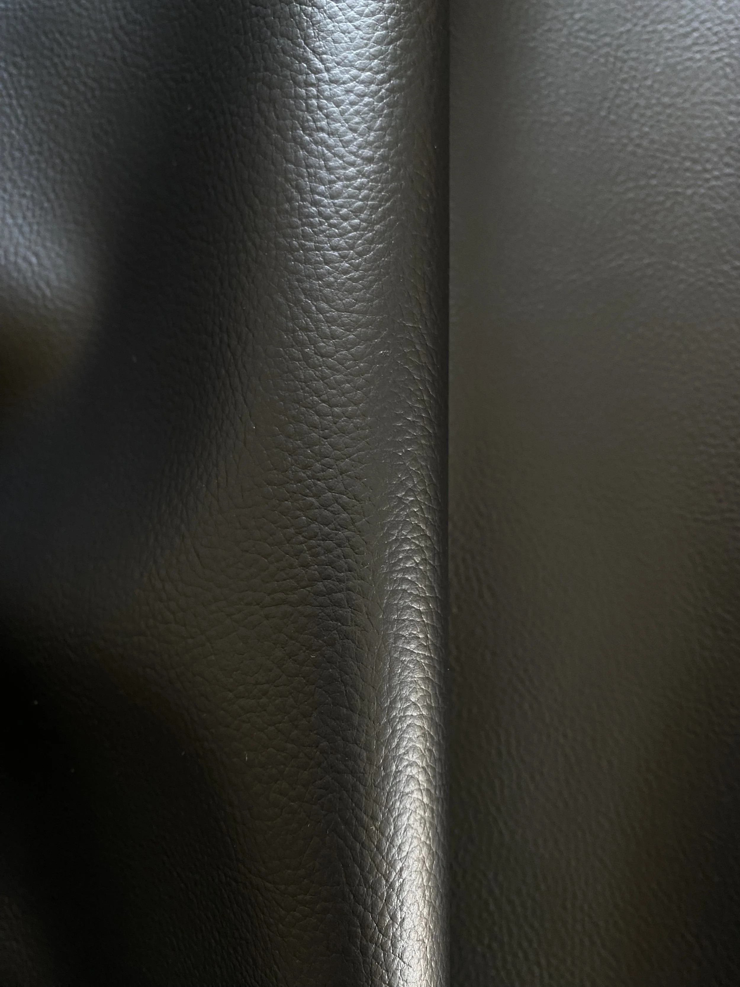 Black textured Elevate™ is an innovative bio-based leather alternative developed by Uncaged Innovations.