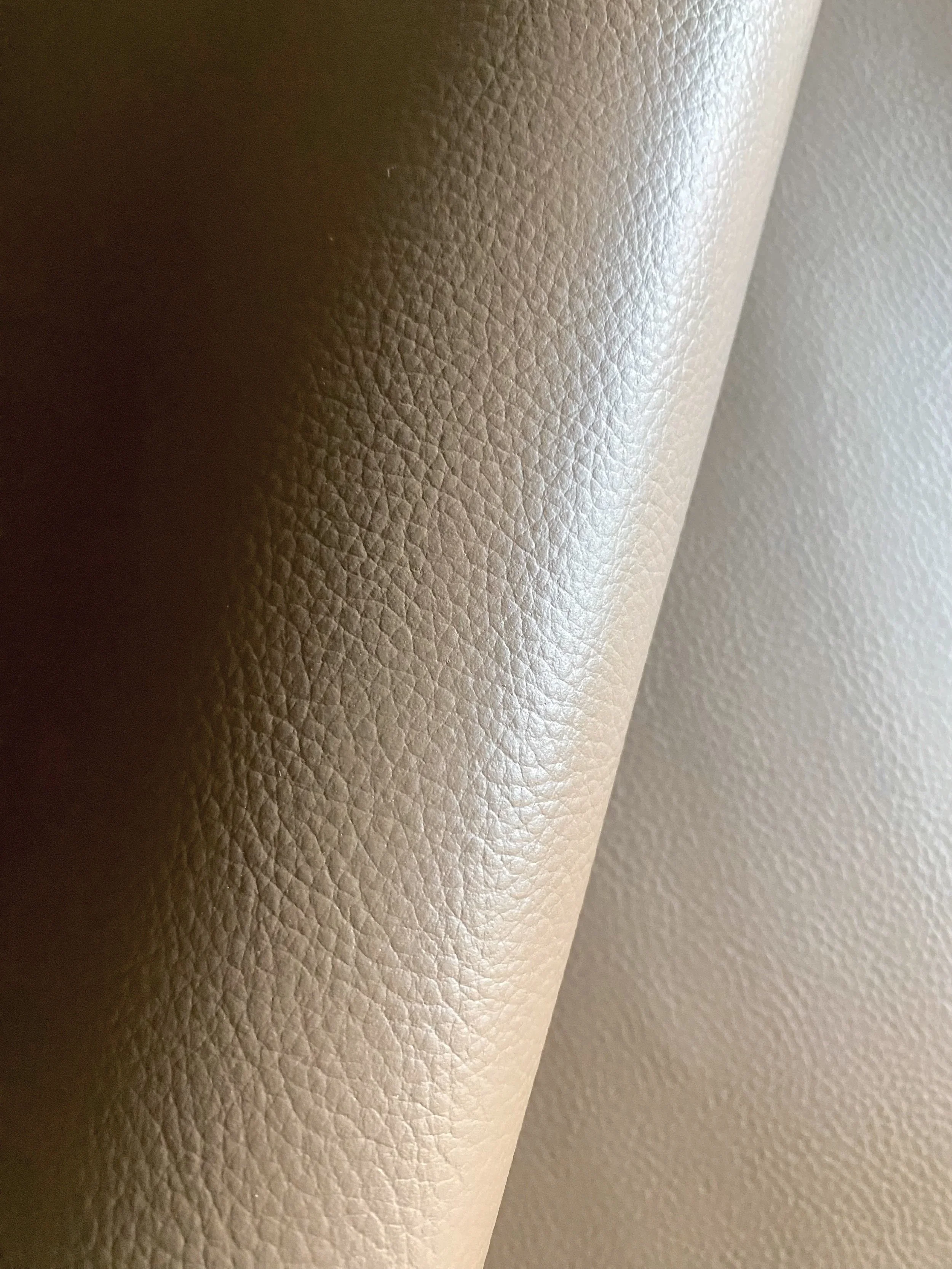 Elevate™ Signature Pebble has soft, premium grained leather appearance with a natural, non-plasticky hand feel. Ideal for structured, flat, top machine stitch designs & products with minimal drape. Low stretch.