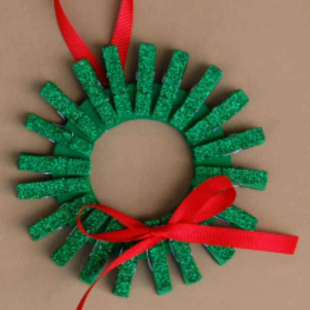 Mini clothespin wreath ornament made by kids