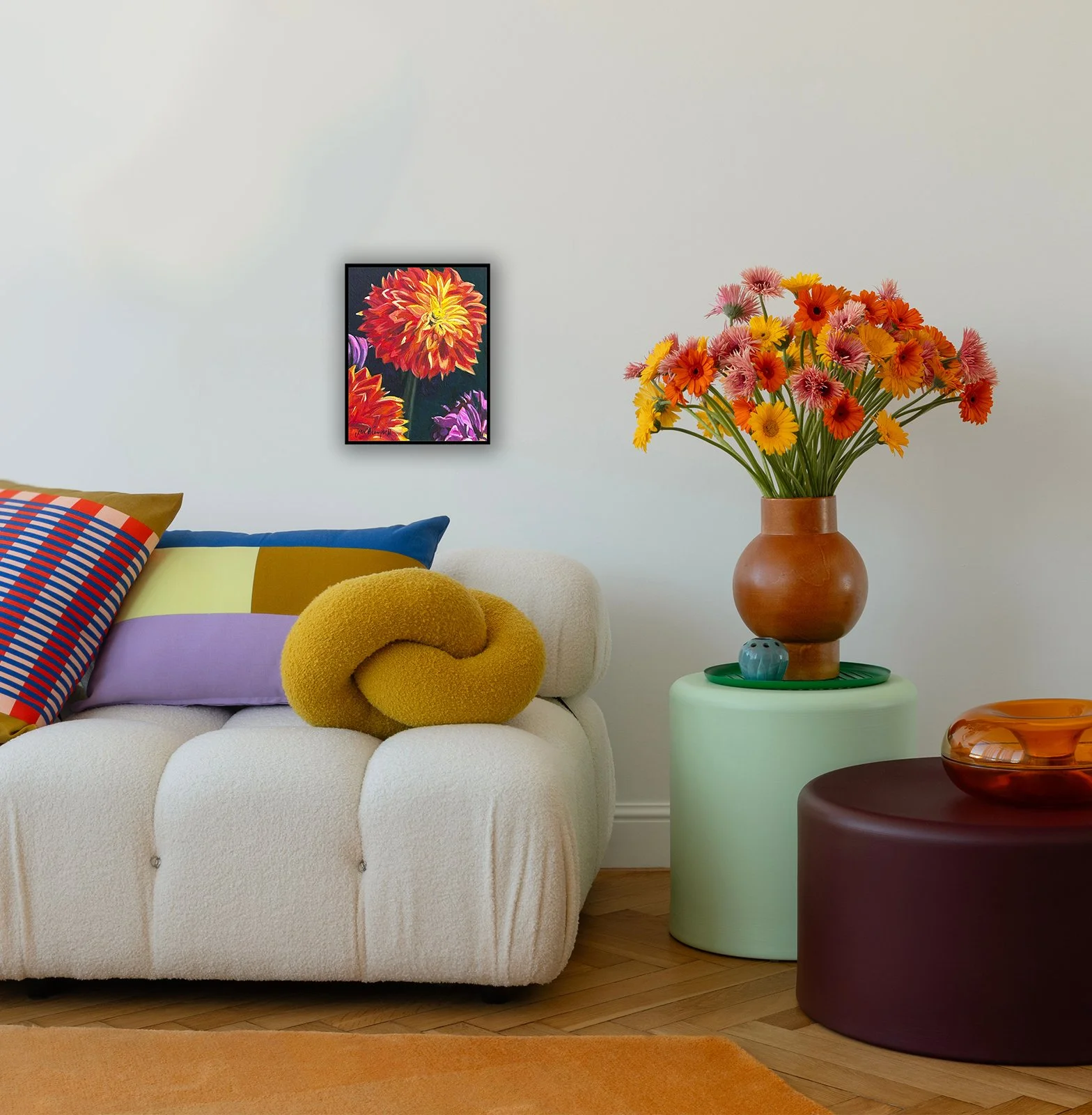 Bright Dahlias, a small acrylic painting of several orange and purple dahlias, adds a soothing charm to a colorful room
