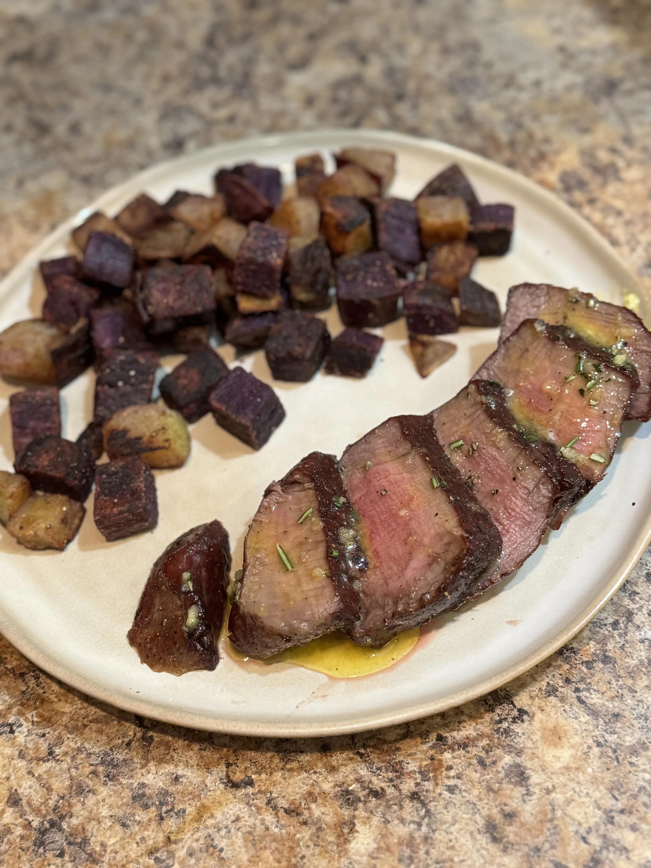 Reverse-Seared Filet Mignon with Garlic Rosemary Butter