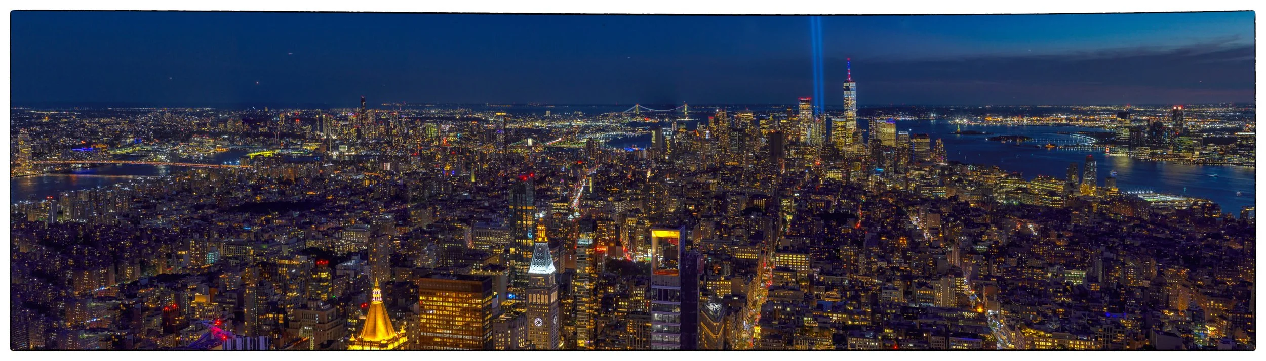 9-11 Tribute in light 25th yr commenoration from Empire St Bldg, NYC 9-11-26