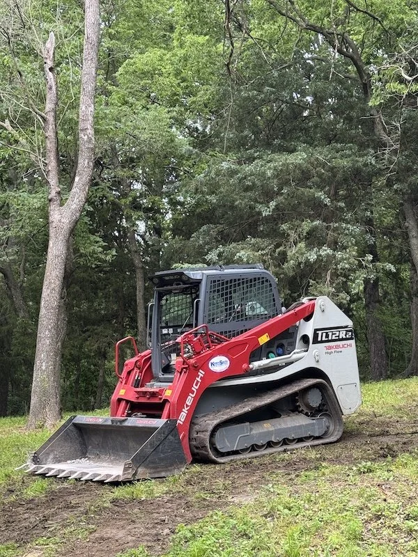 Land grading and slope control in Missouri with skid steer equipment