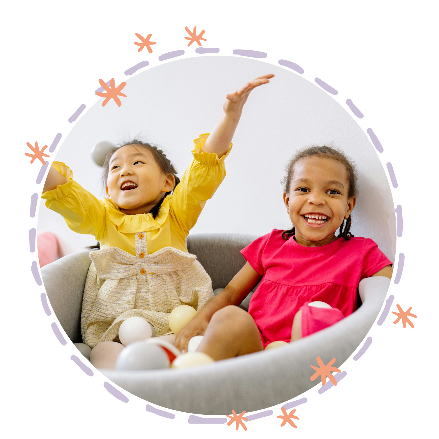 two girls sitting in a chair playing during speech therapy