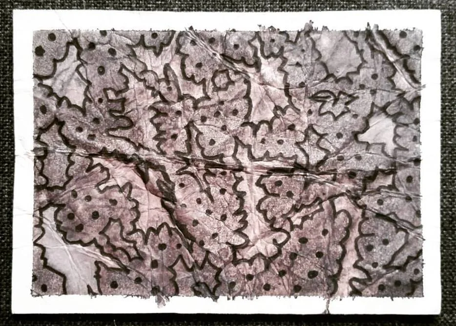 A small grayscale watercolor and pen painting on crumpled paper