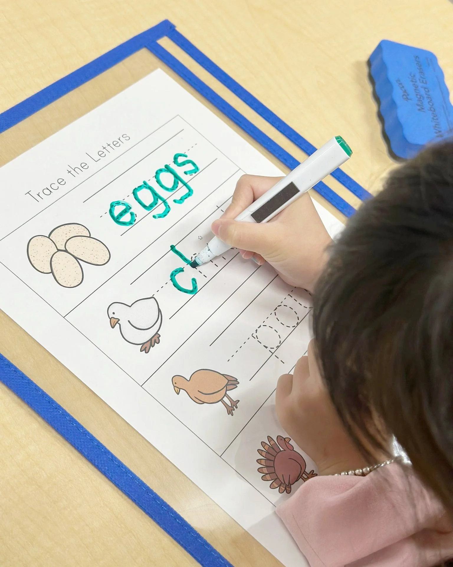 Our students are busy practicing their writing and word skills by tracing letters and sounding out words. These early literacy activities strengthen letter recognition and language development, helping kids turn single letters into written stories!