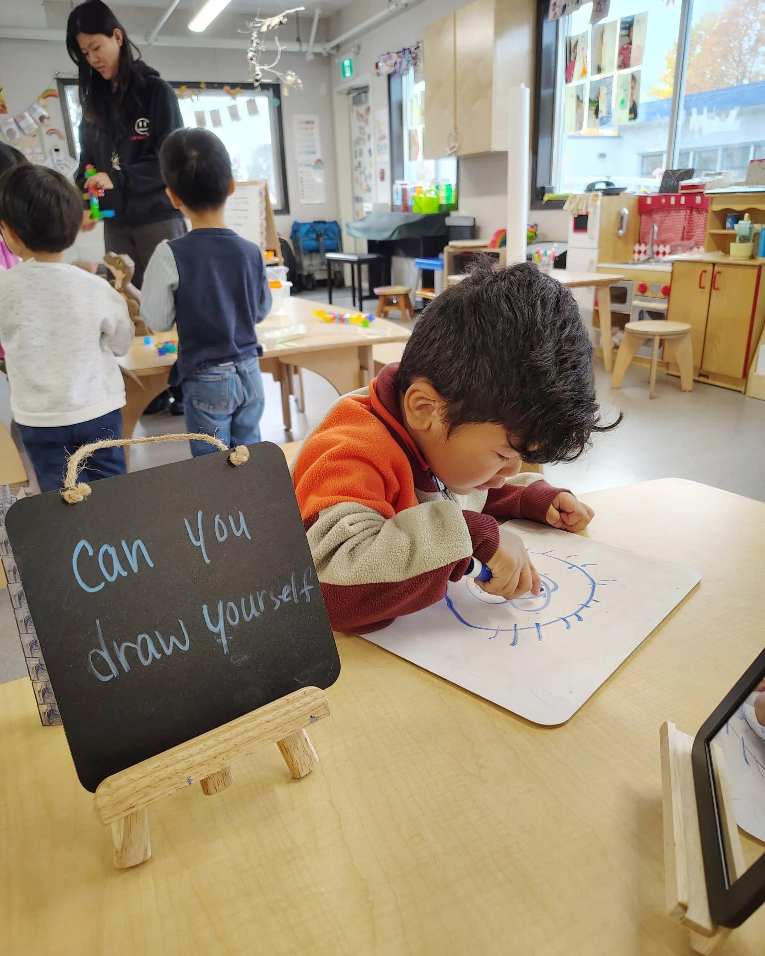 Our Pre-K artists took a closer look in the mirror this week, exploring what makes each of them unique. Drawing self-portraits helps children develop self-awareness and build confidence while they strengthen their fine motor skills. As they notice de