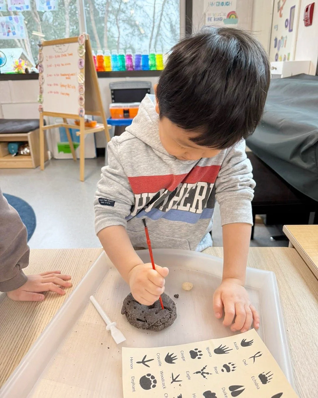 Continuing with our bird study, our students made their own pretend mud to explore how birds leave footprints and tracks. As they experimented, we talked about where birds live and how we can spot signs of wildlife outdoors. Hands-on experiences like