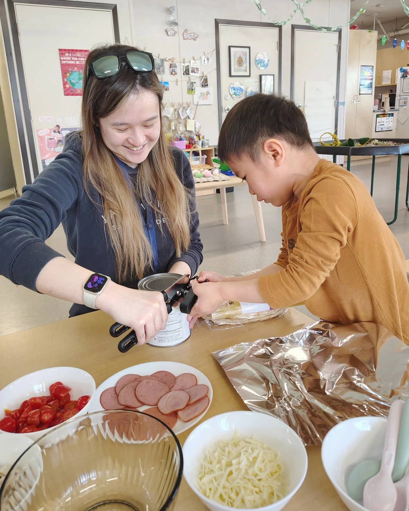 Our Pre-K students are learning in the kitchen!

Recently, we explored how to make our own pizzas by practicing measuring and following step-by-step instructions from start to finish. Cooking activities support early math skills, fine motor developme