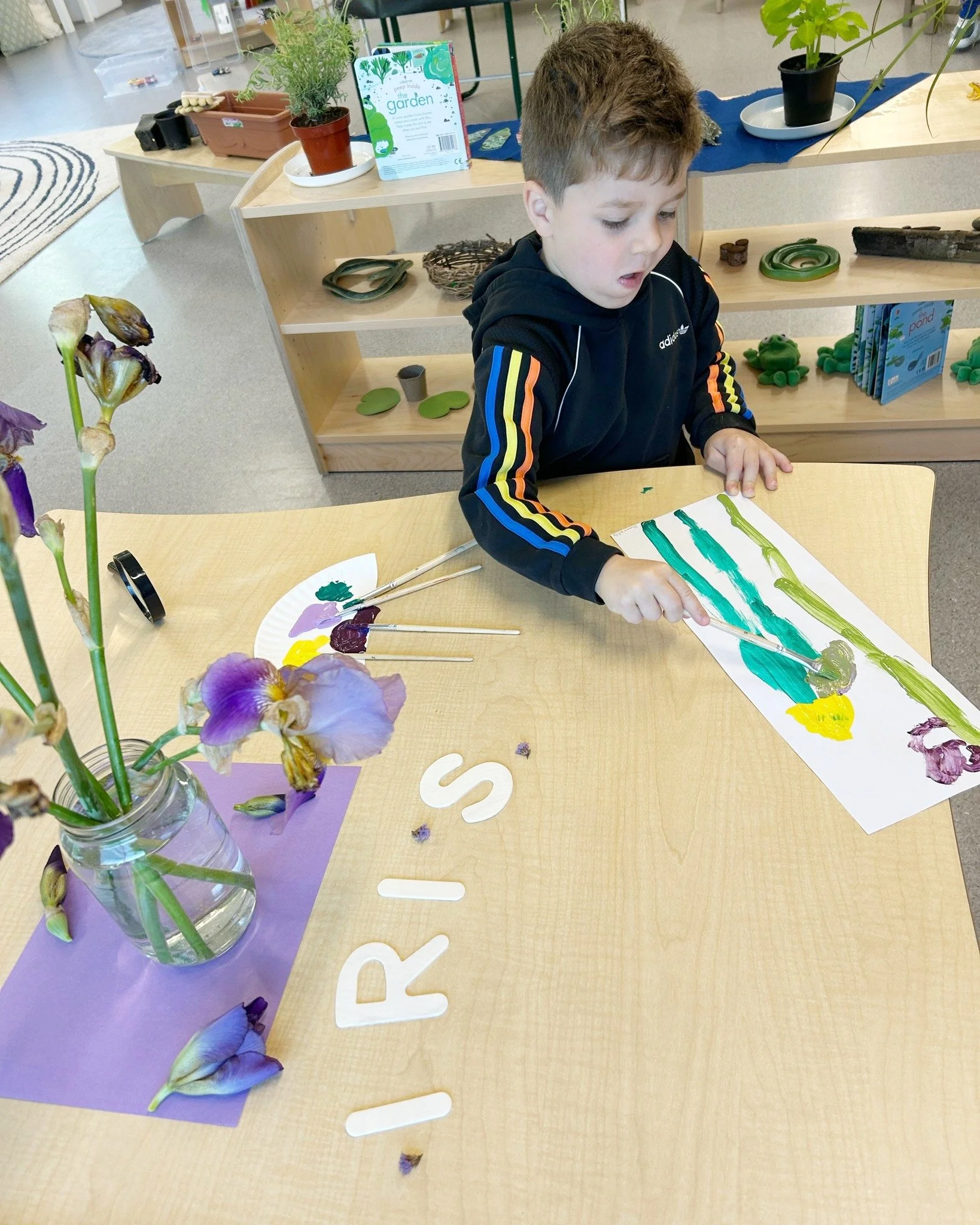 We've been looking very closely at nature lately! Our PreK students took some time to carefully observe an iris flower before creating their own paintings. By studying the flower&rsquo;s colours, shapes, and details, they practiced observation skills
