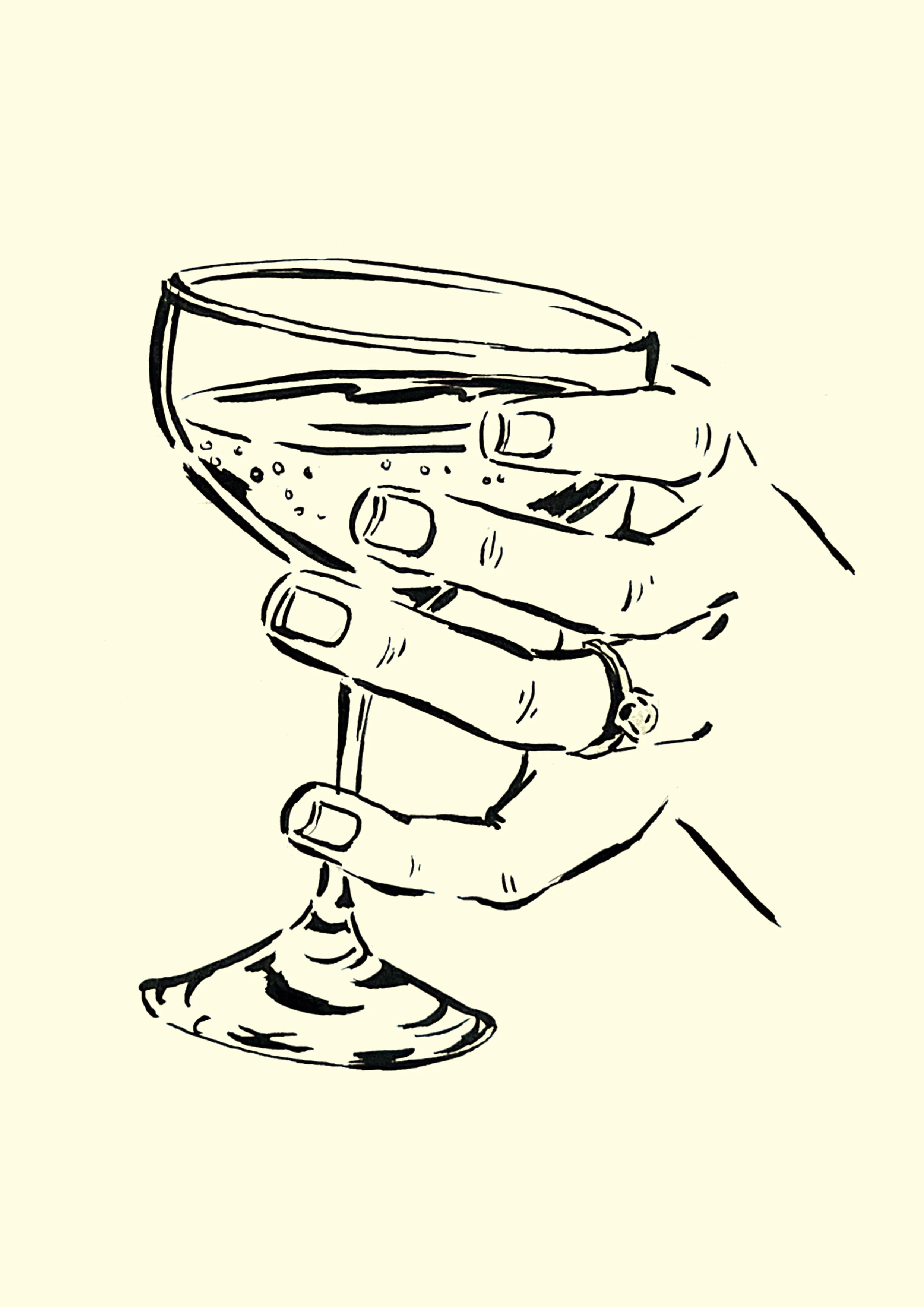Signature cocktail held by a hand with engagement/wedding rings at Auckland wedding reception