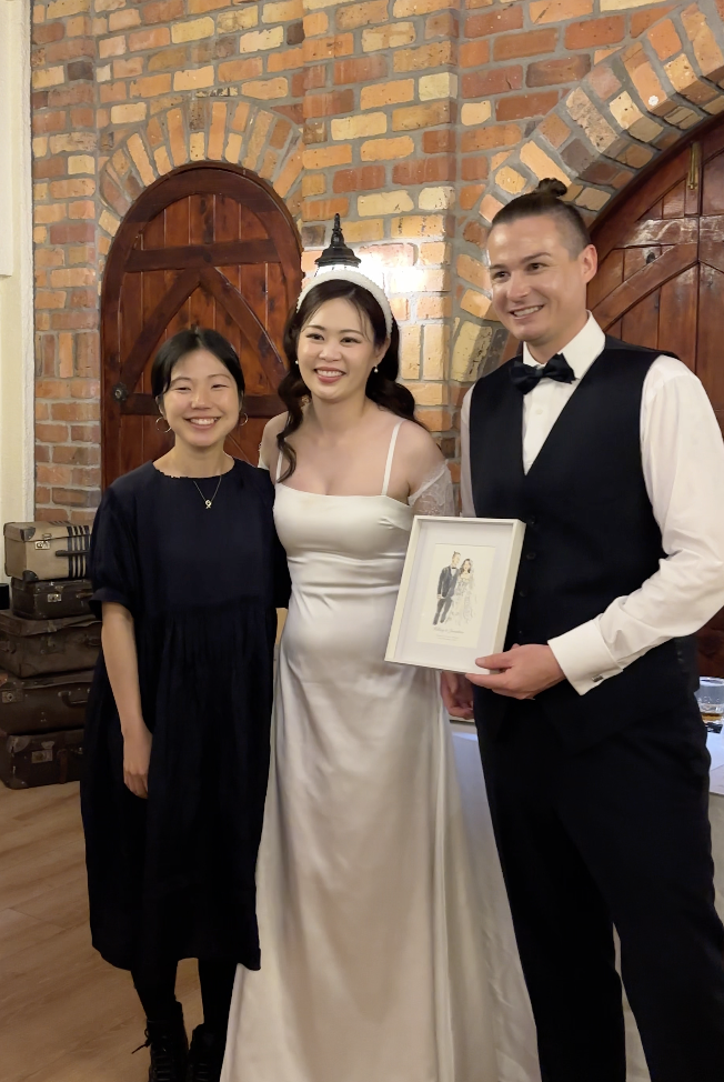 A completed live illustration portrait from a wedding event
