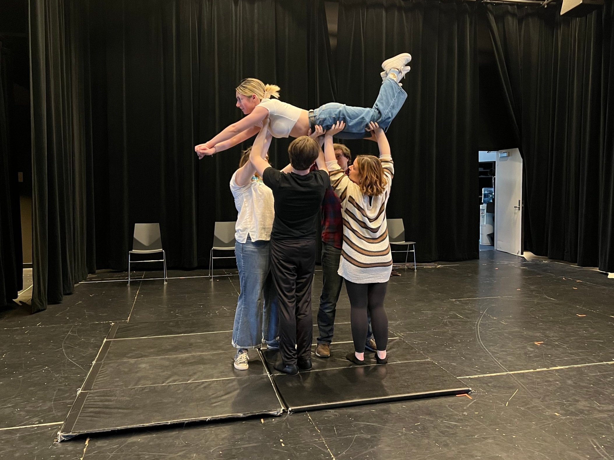 students doing a physical acting exercise