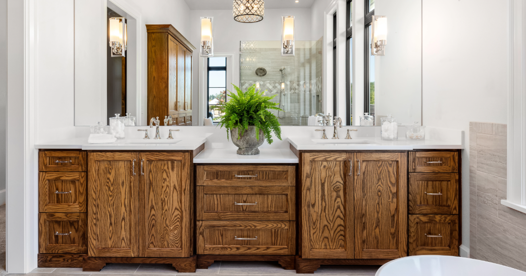 Double bathroom vanity cabinetry with warm wood storage and clean proportions by Hester Family Millwork serving Gainesville GA, Hall County, North Georgia, and Metro Atlanta.