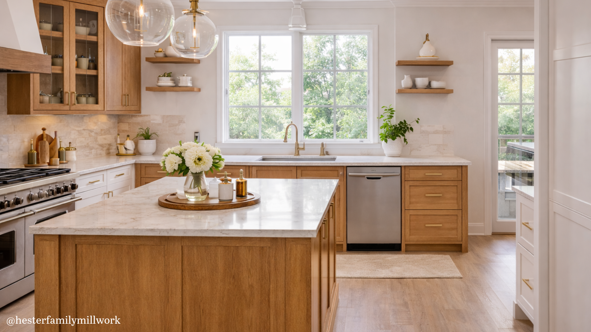Inset kitchen cabinets with a mix of painted white cabinetry and stained wood elements, highlighting detailed craftsmanship, clean lines, and a light, elegant kitchen design