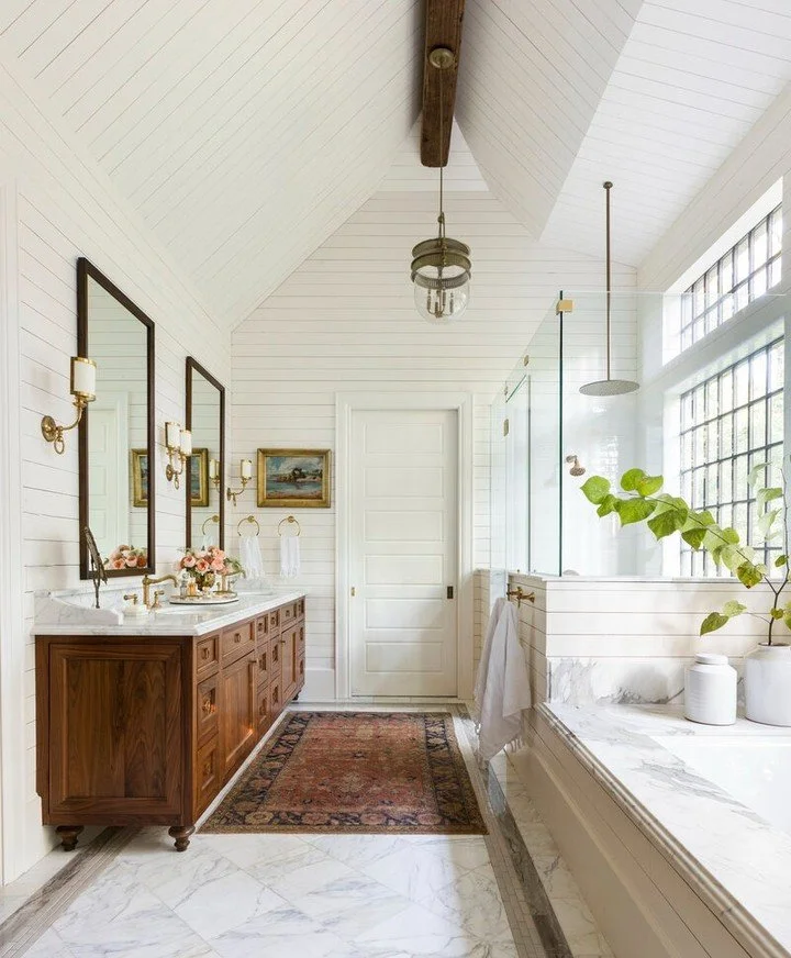Which finish would you choose for your bathroom cabinetry? 🪵 Warm walnut or ⚪️ painted wood?

Design Tip: Pairing natural wood with stone or brass brings warmth and depth to neutral spaces.

Like this look? Save for later, comment your pick, and fol