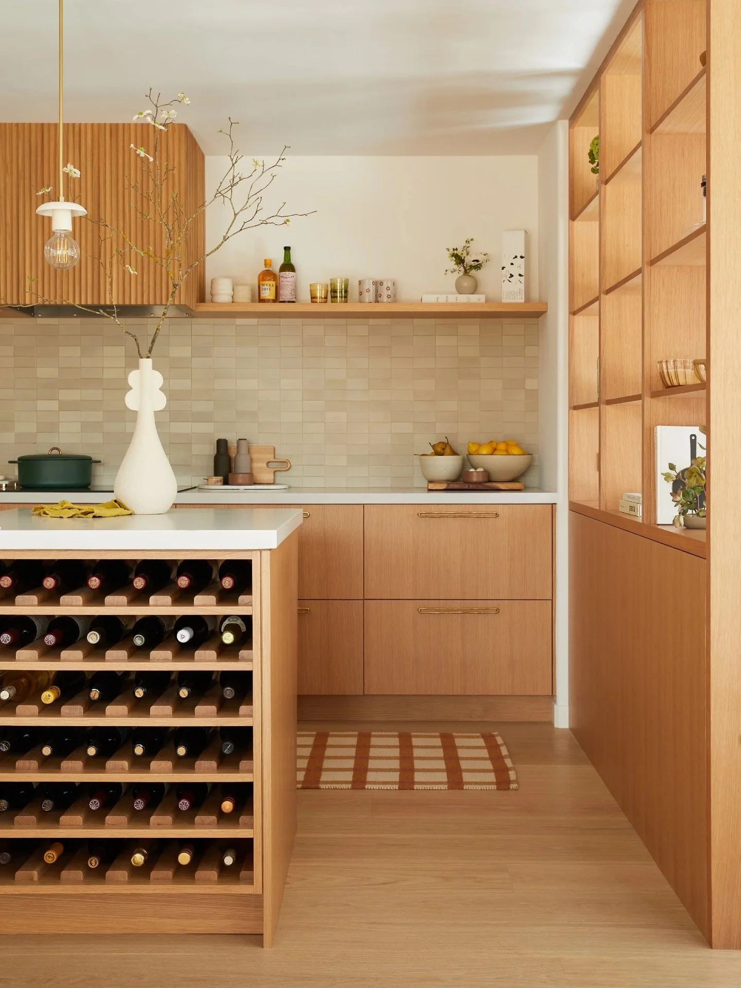 Integrated wine storage works best when it is designed into the cabinetry from the start. It keeps clean lines intact while adding function. If your kitchen needs storage that feels intentional, we should plan it that way. 📞 Text us at 470-228-2099 