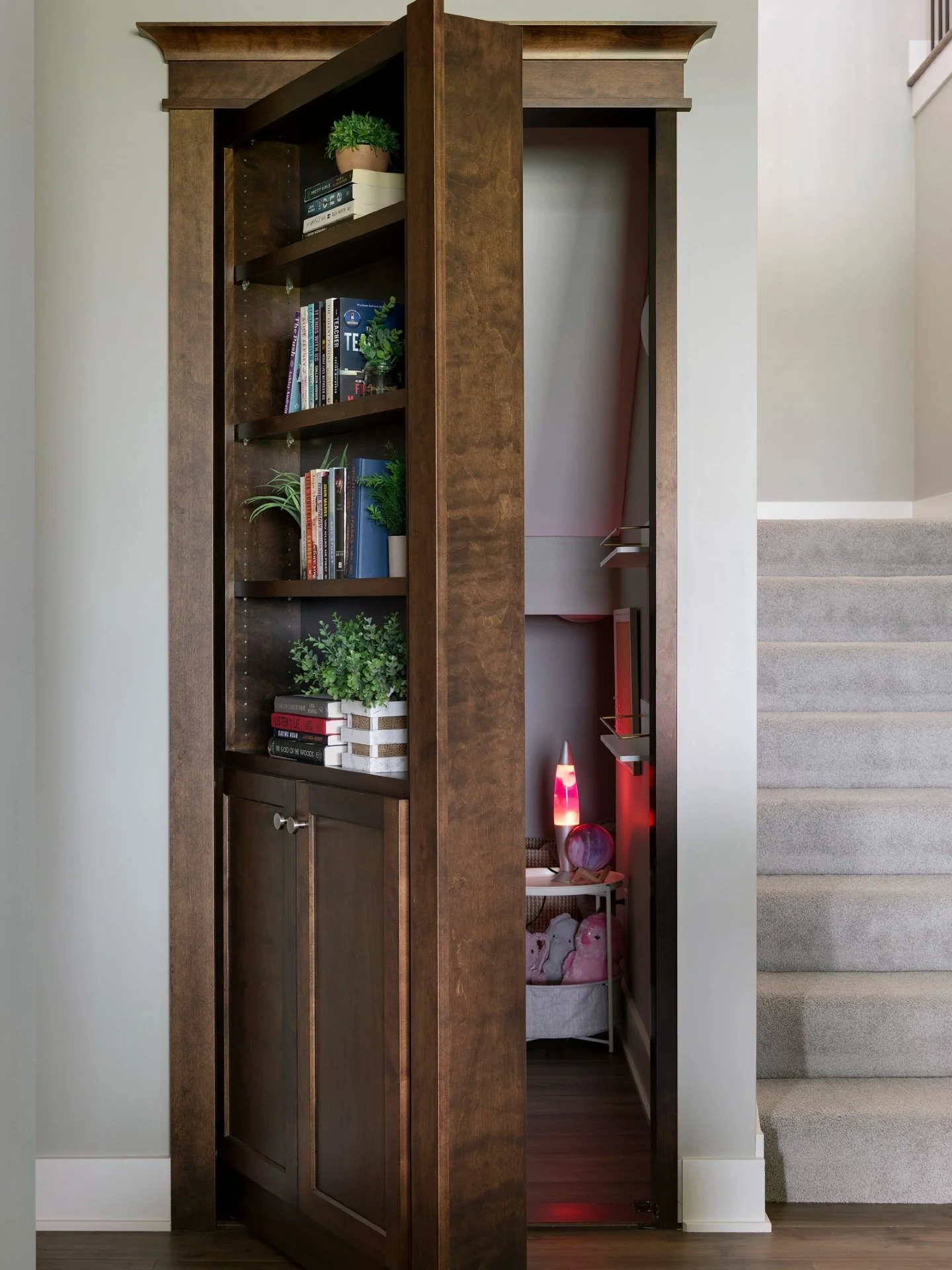 A hidden bookshelf door and a full theater room in the same basement? This is what smart, intentional millwork looks like. Storage that disappears when you want it to, and a space built for real life, real families, and real use.

If you love cabinet