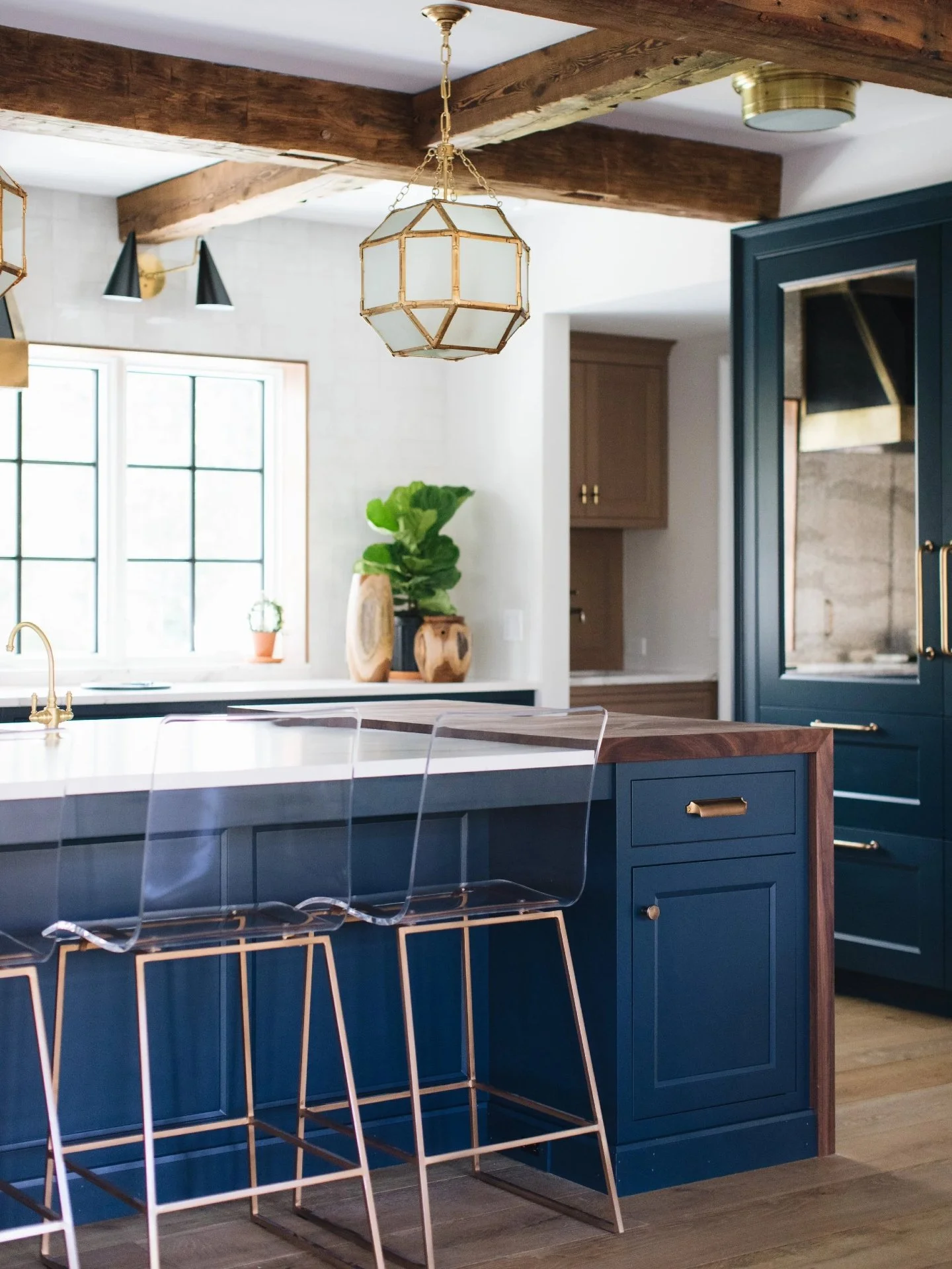This color gets me every time. It&rsquo;s bold, but it doesn&rsquo;t feel loud. It&rsquo;s rich, but still timeless.
And paired with the warmth of the wood beams and brass&hellip; it just works.

One thing I always tell clients, if you&rsquo;re going