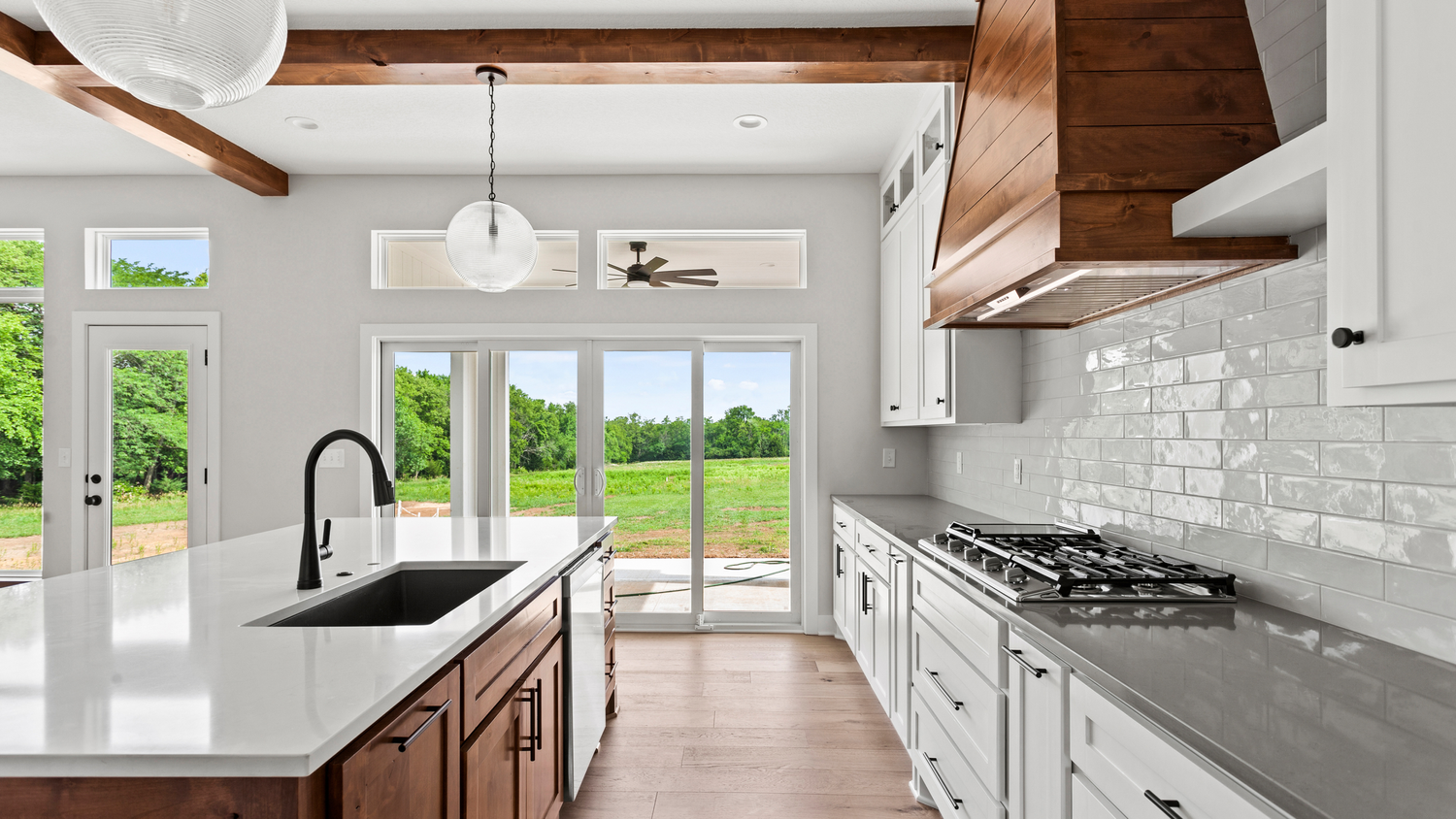 Two-tone kitchen cabinet color ideas by Hester Family Millwork