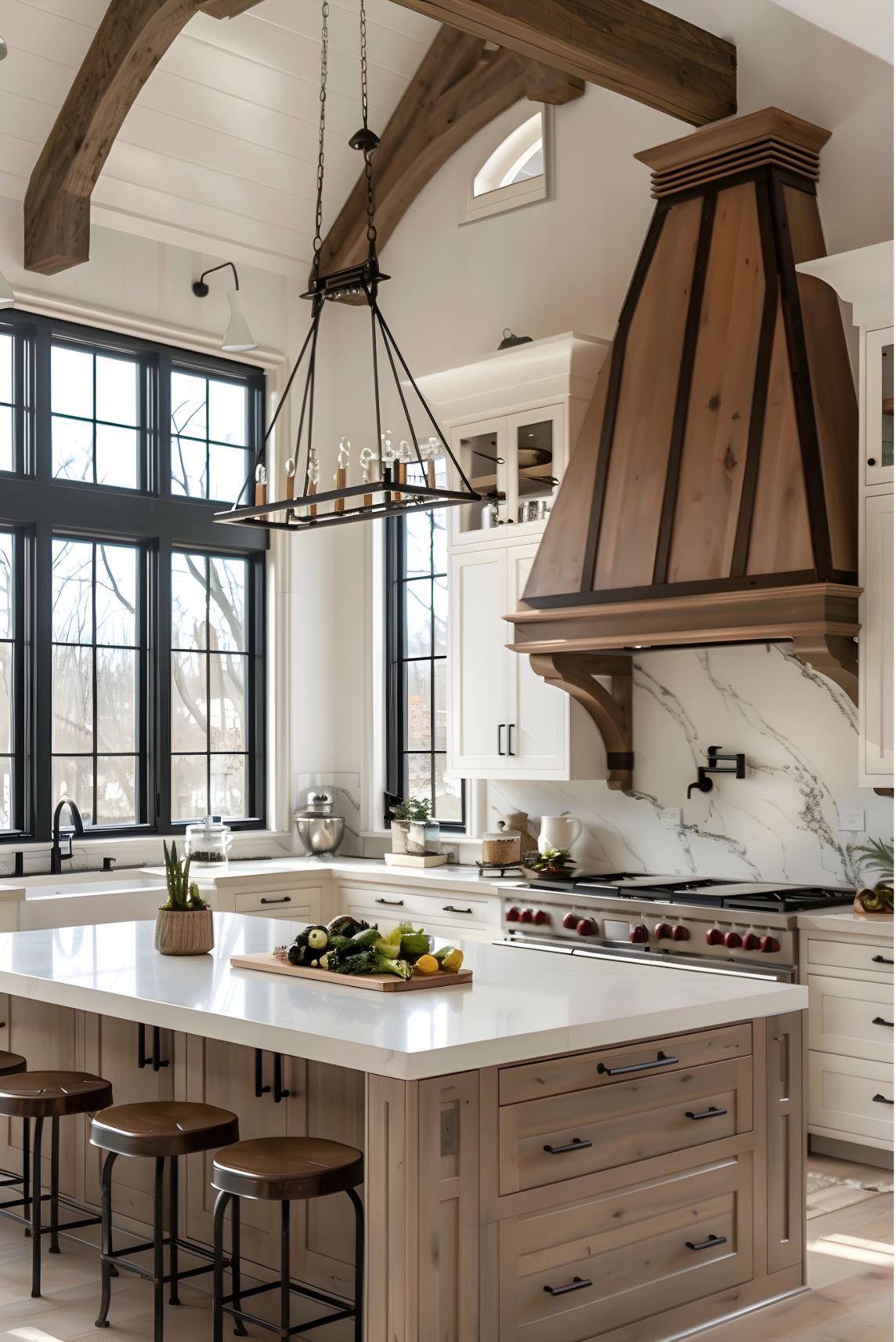 Wood kitchen island with statement range hood and layered cabinetry details reflecting 2026 design trends