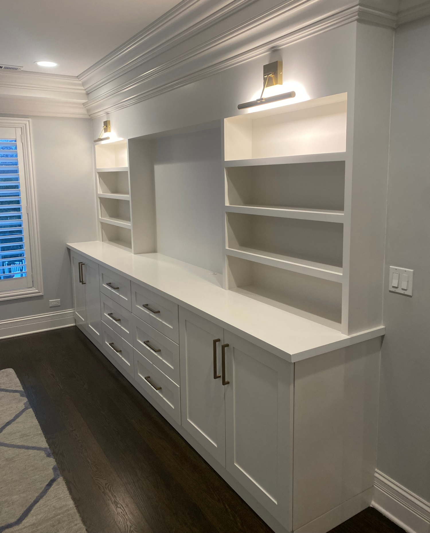 Built-in office cabinetry with white storage drawers by Hester Family Millwork in Gainesville Georgia