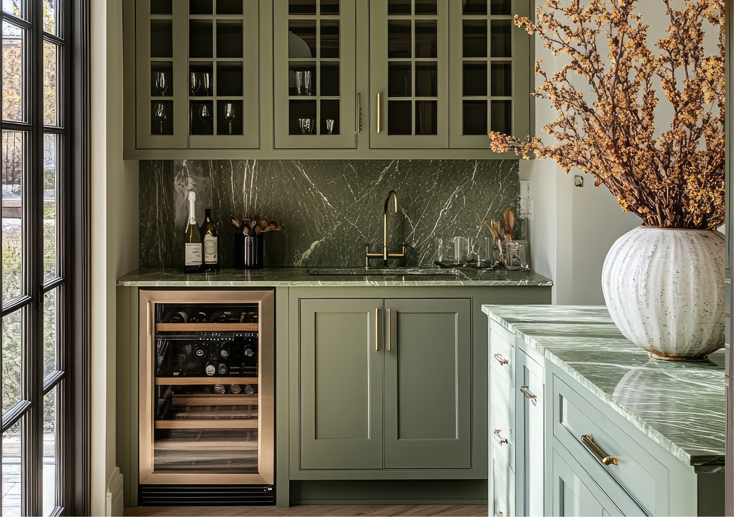 Green bar cabinetry with custom millwork by Hester Family Millwork