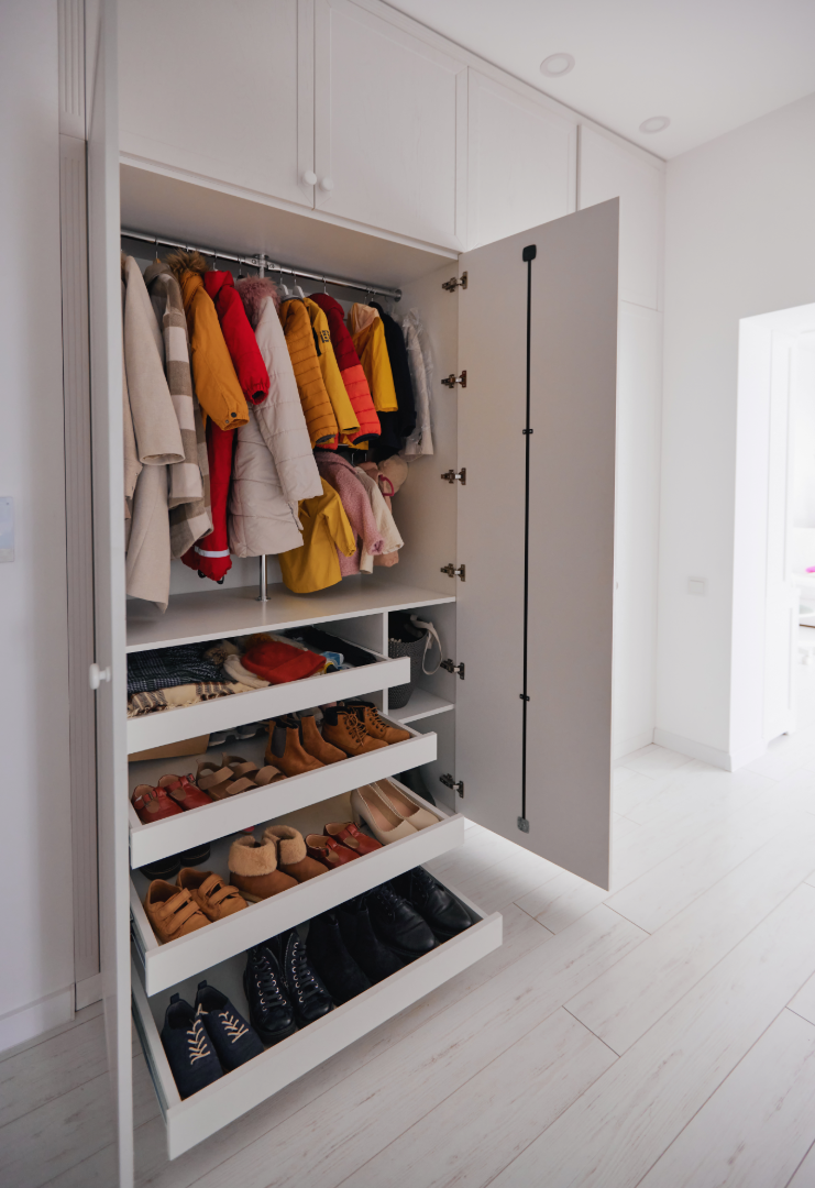 Mudroom coat and shoe cabinet storage by Hester Family Millwork
