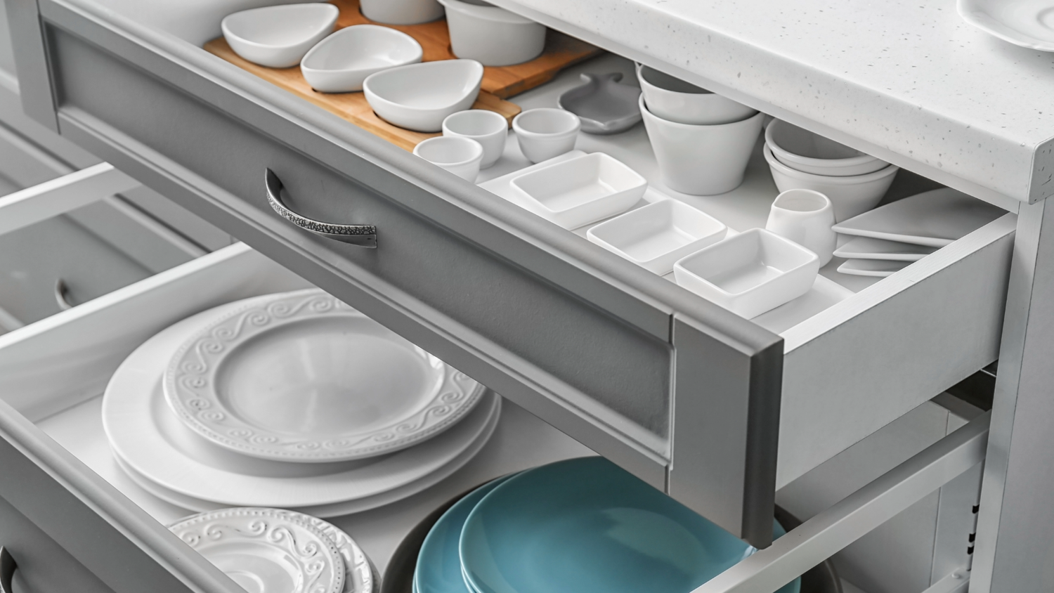 Cabinet hardware detail in a custom kitchen by Hester Family Millwork