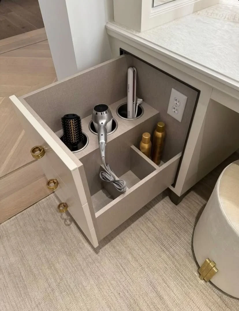 Integrated bathroom vanity drawer with built-in storage compartments for hair tools and products