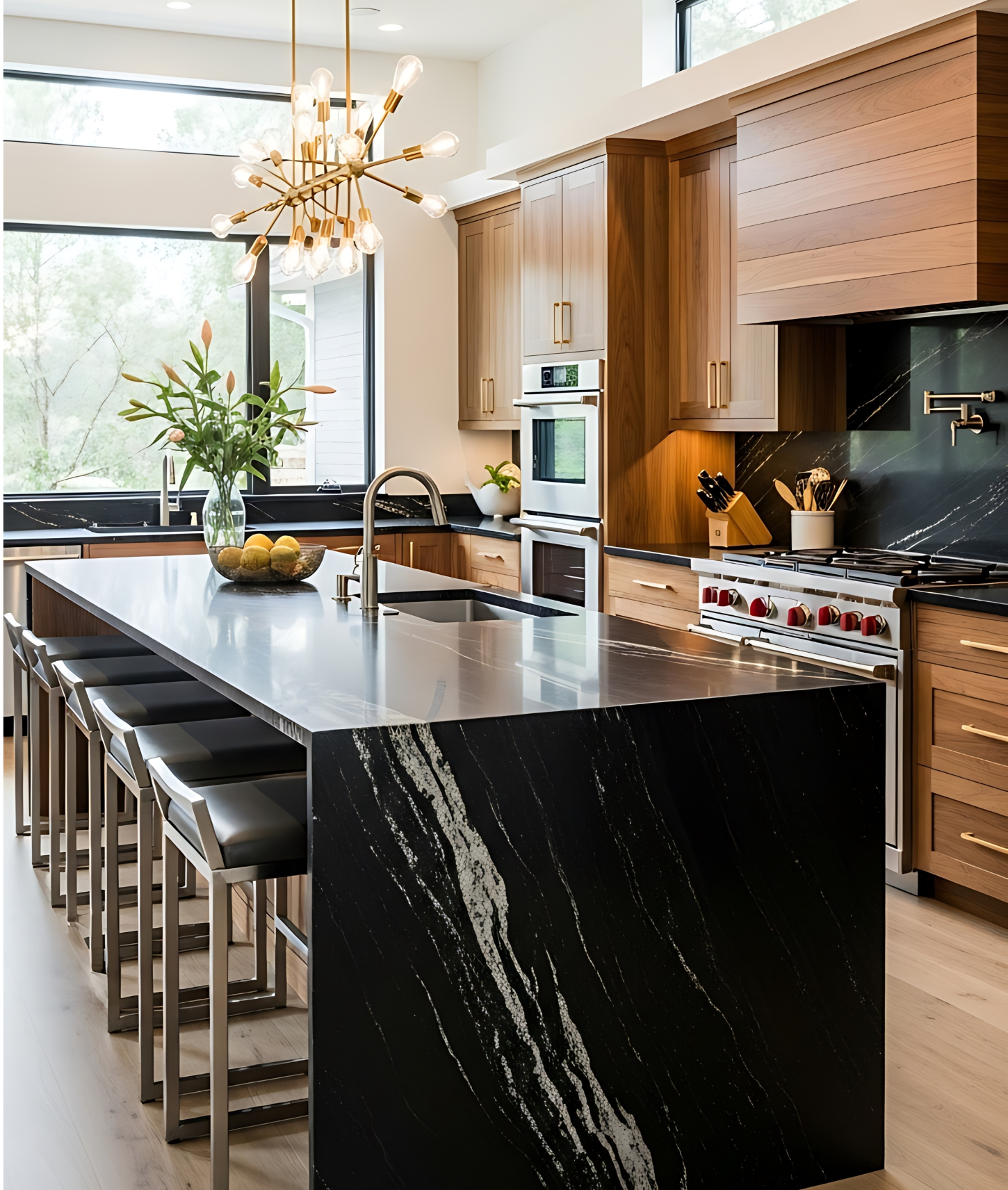 Walnut kitchen island paired with warm neutral cabinetry and mixed metal finishes, showcasing 2026 kitchen cabinet trends