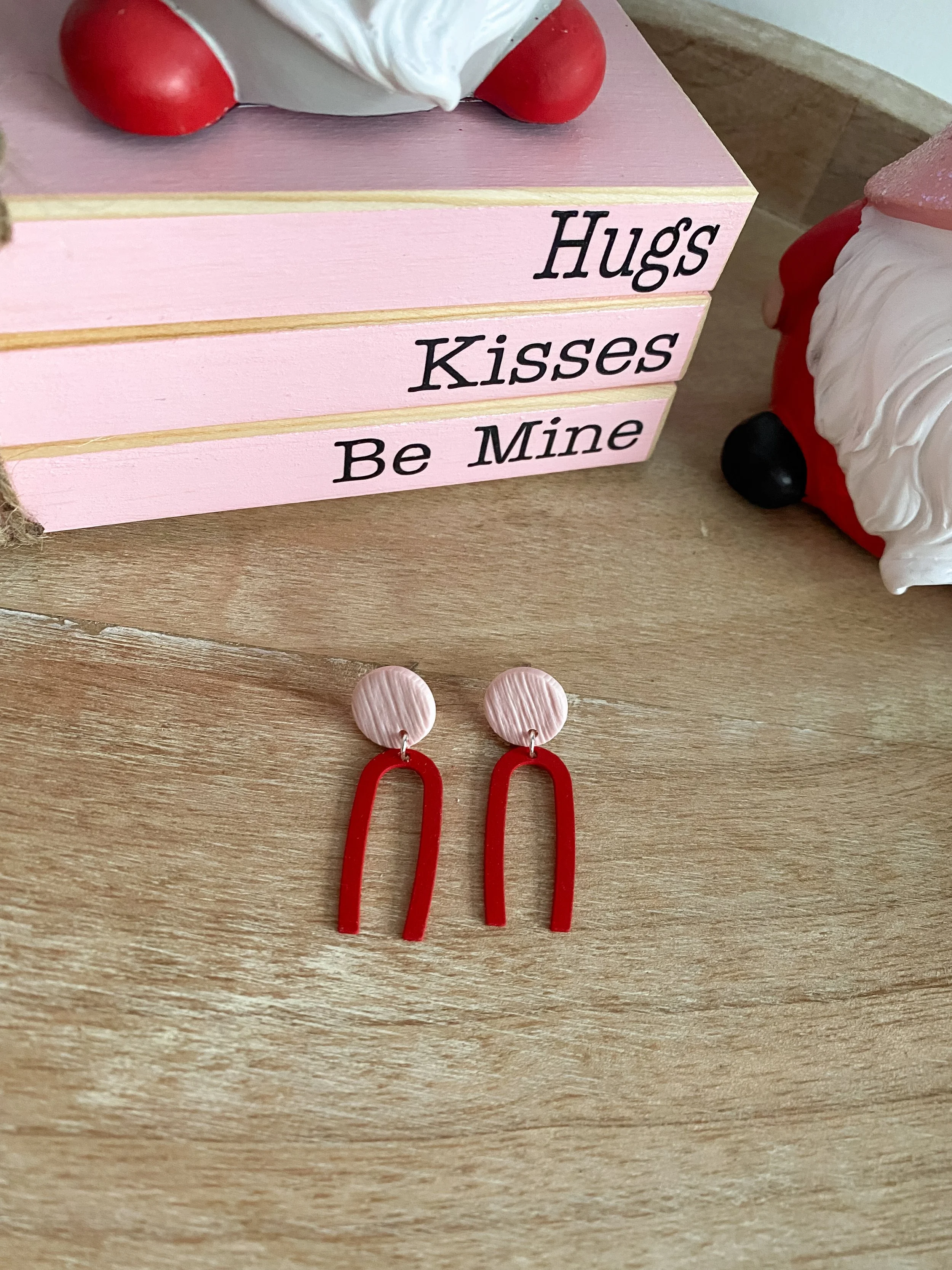 Thin arch pink and red polymer clay earrings