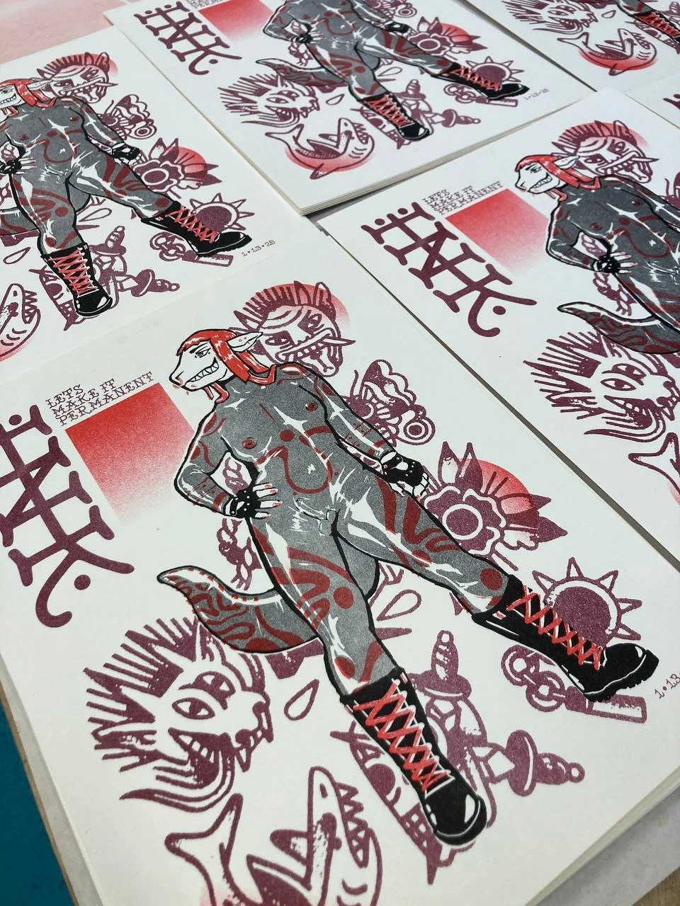 "Let's Make it Permanent" scarlet, burgundy, and black ink on off white paper. By Theo