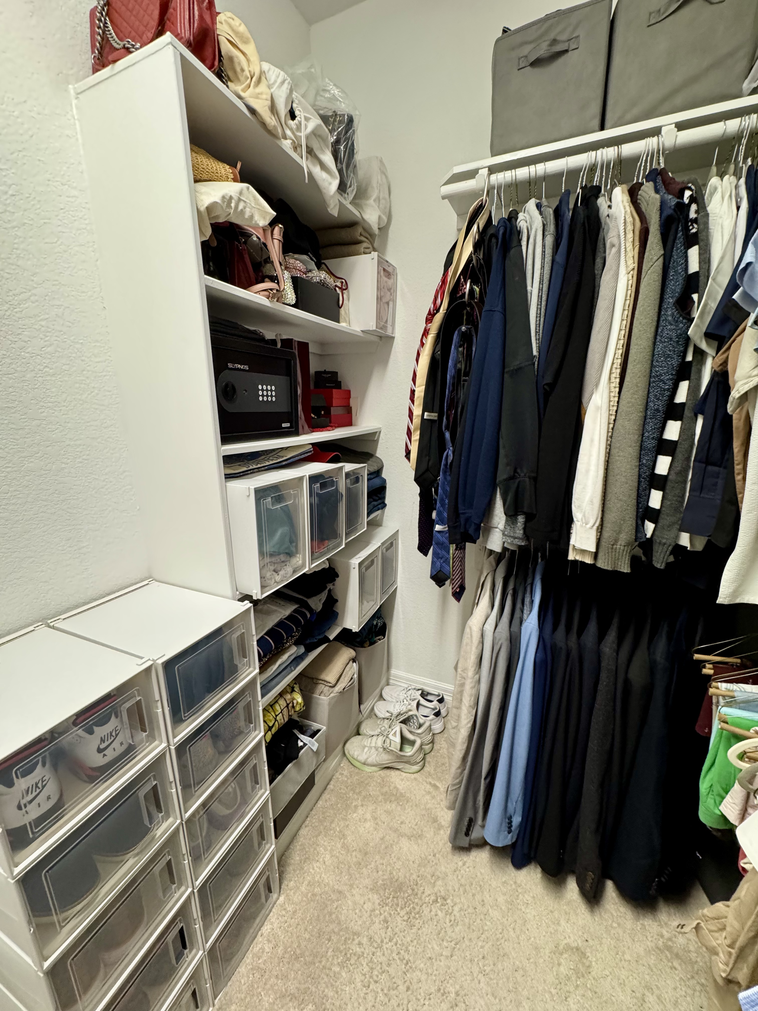 After closet organizing in Sugar Land by Crystal Aura Organizing creating balanced space for him.