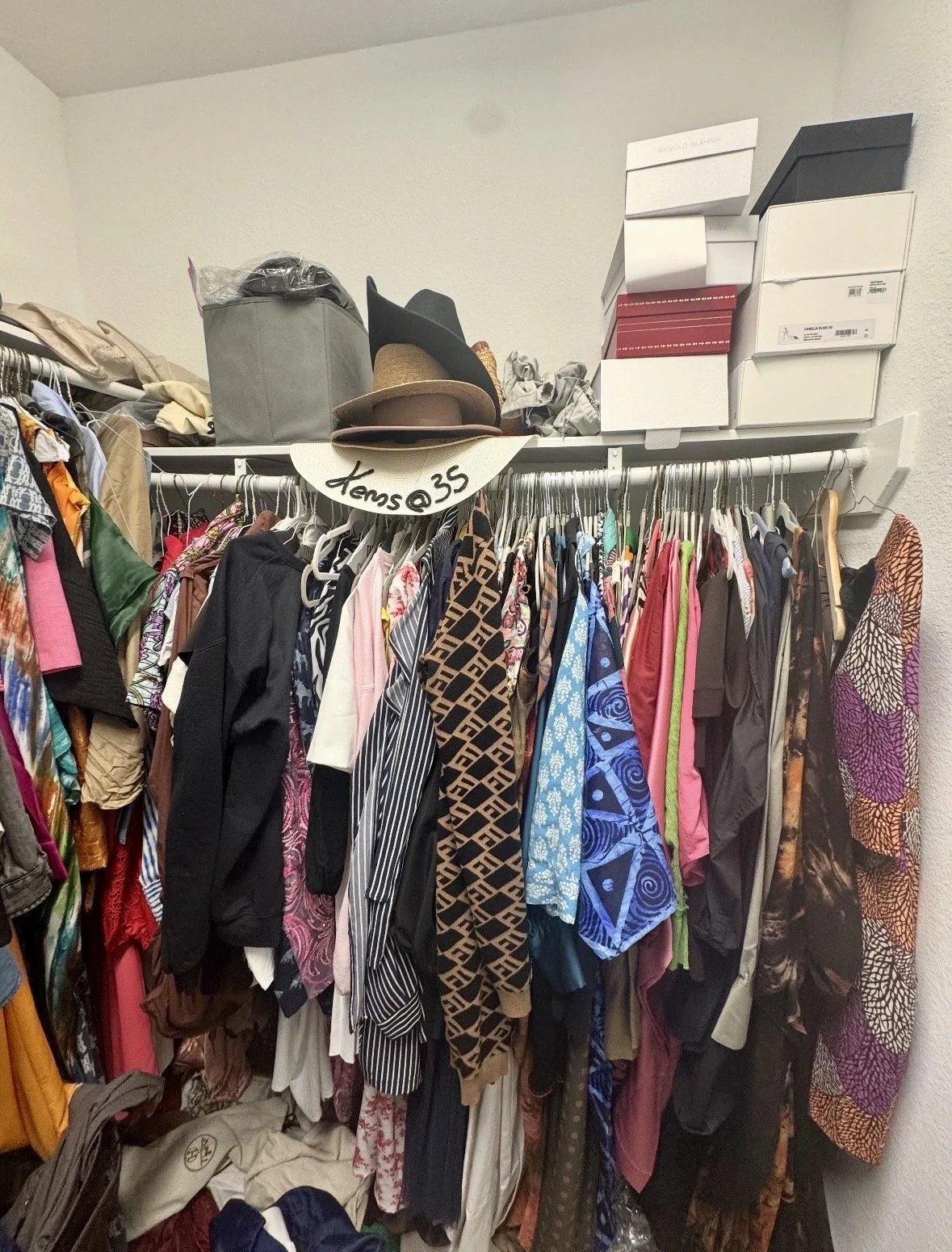 Shared closet reset in Sugar Land by Crystal Aura Organizing reducing visual overwhelm.