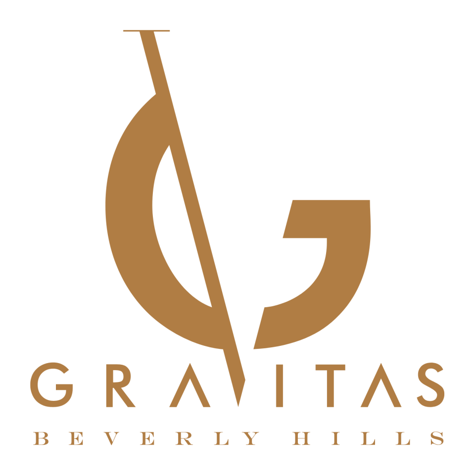 Logo for Gravitas Beverly Hills with a stylized letter G and abstract design in gold and black.